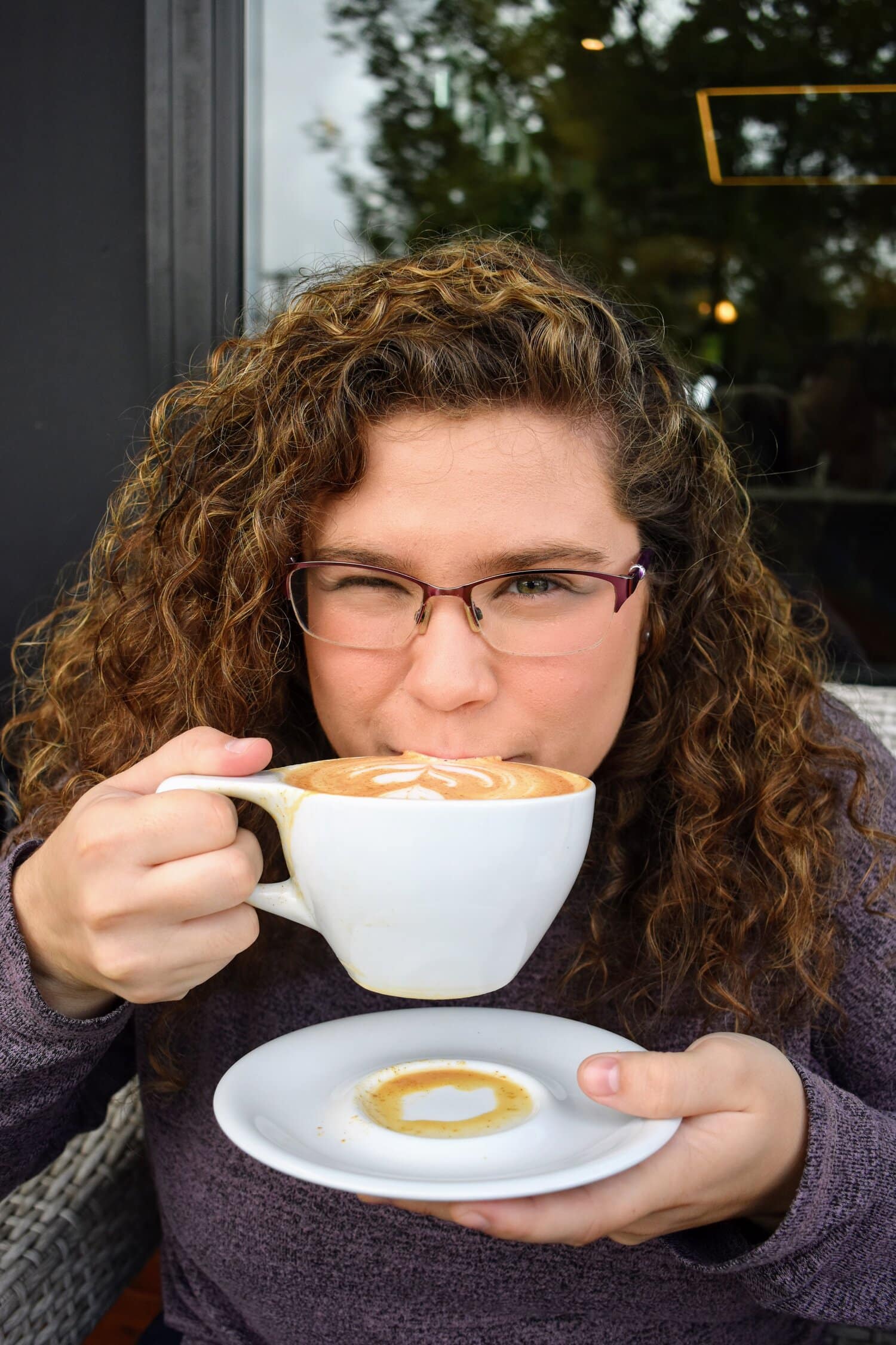 We have to start off with the classic pumpkin spice latte. Savannah Williamson, freshman, enjoying a cup of this popular fall treat.