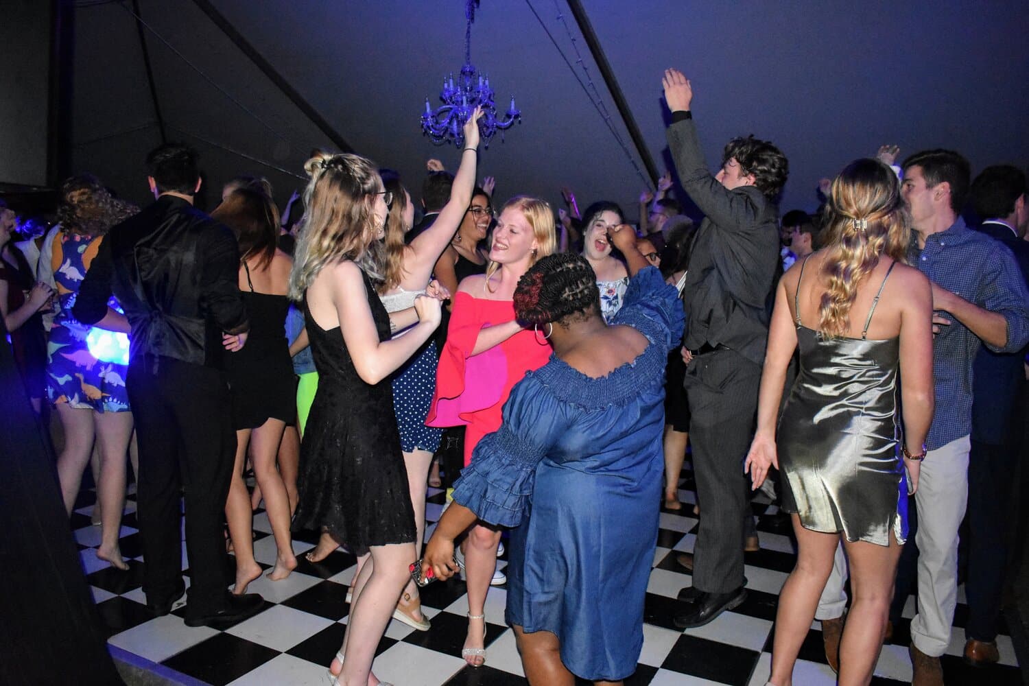 A’mirical Burton, Mackenzie Craine, and Sydney Boone, freshmen, dance together as the homecoming dance begins.