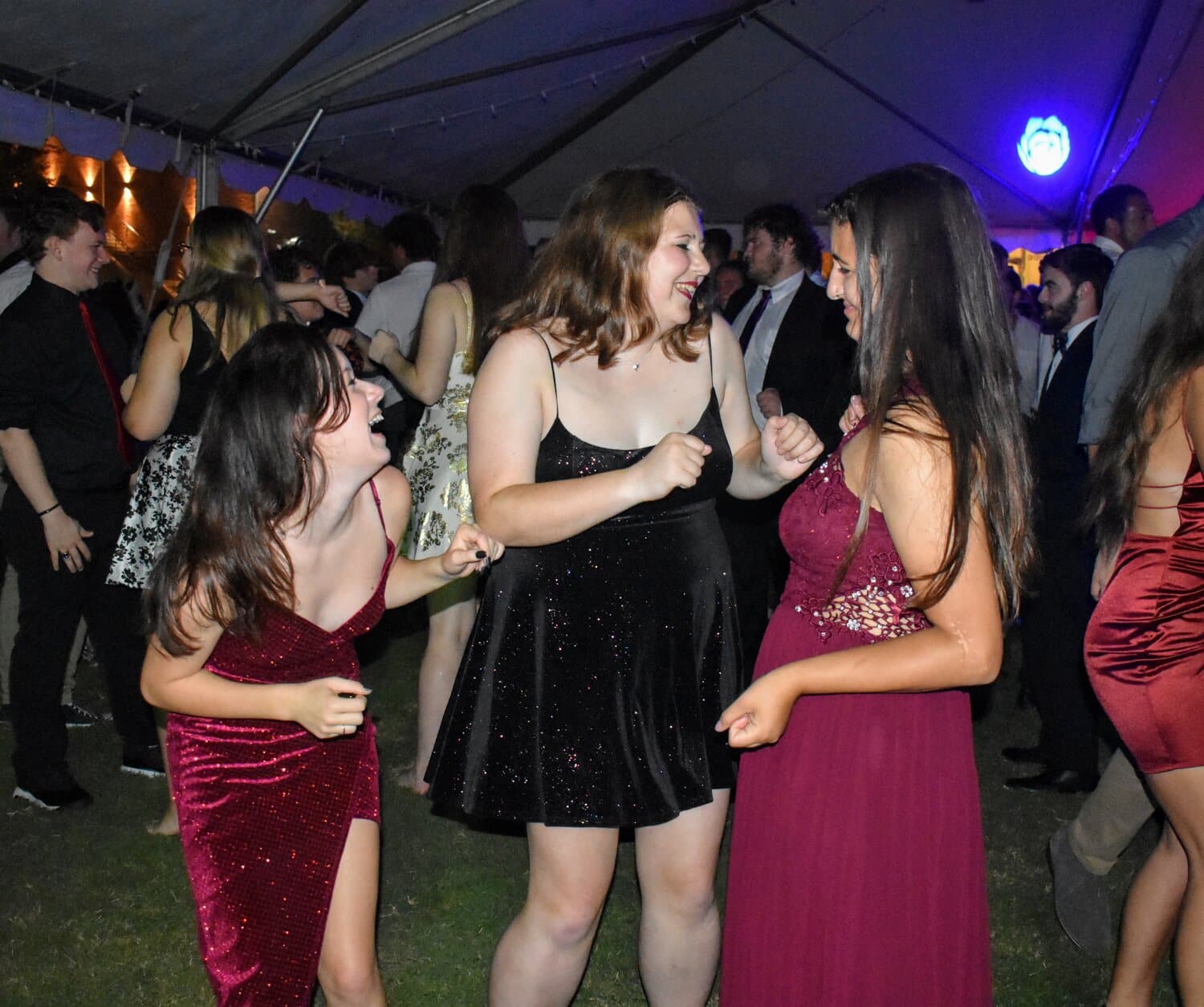 Kellen-Elizabeth Jordan and Meghan Frady, freshmen, and Sydney Johnson, sophomore, share a laugh in excitement for the dance.