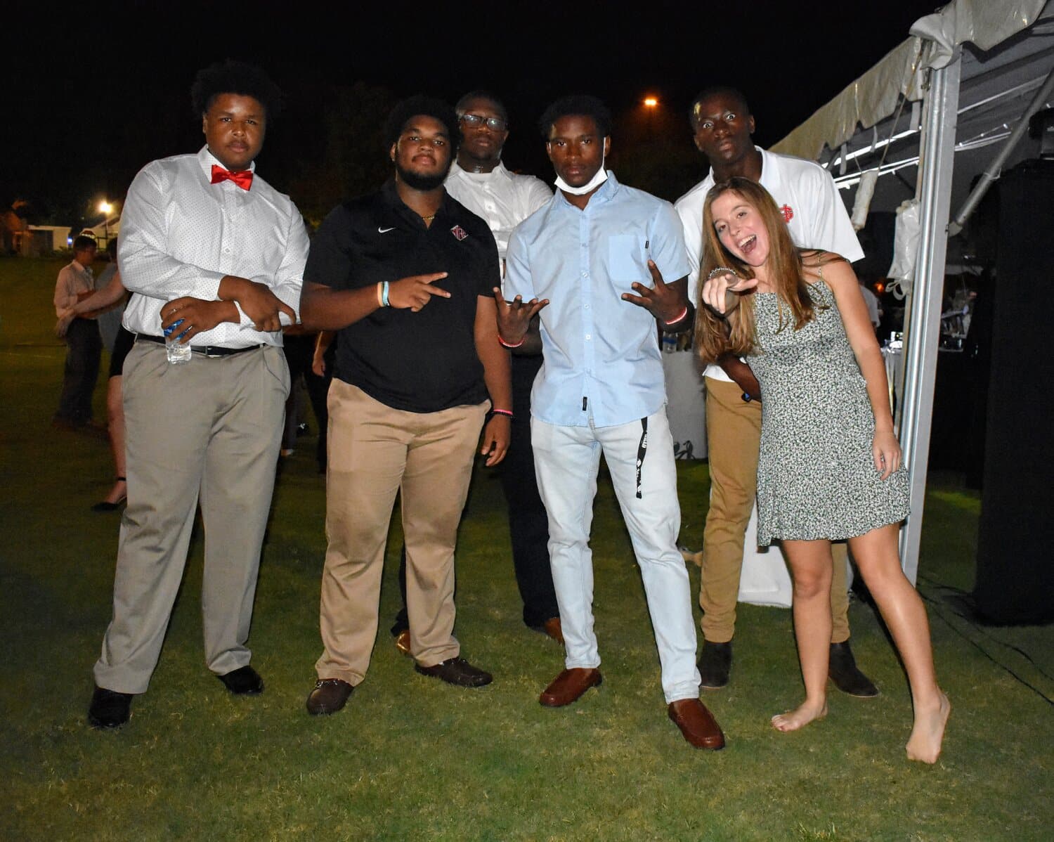 Termaine Epps, Donovan Edwards, Sam Cooper, Ivy junior, Justin Rashid Rouse, freshmen, and Devonaire Willouhhby, sophomore, pose together for a group picture.