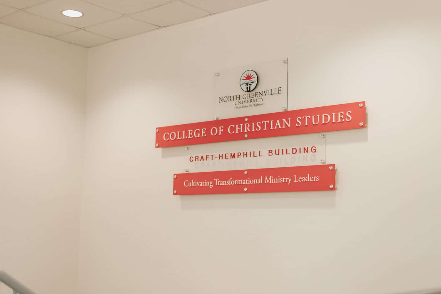 The new College of Christian Studies sign in the Craft-Hemphill Building.