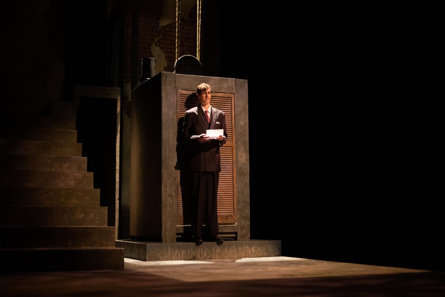 JP Warnick, playing Eurydice’s father, read a note written to Eurydice in one of the opening scenes of the play.