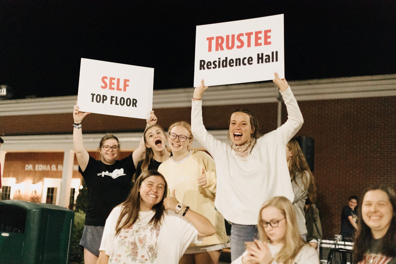 Self and Trustee hall girls are cheering on their residence halls as they compete in the annual homecoming opening ceremony volleyball tournament.
