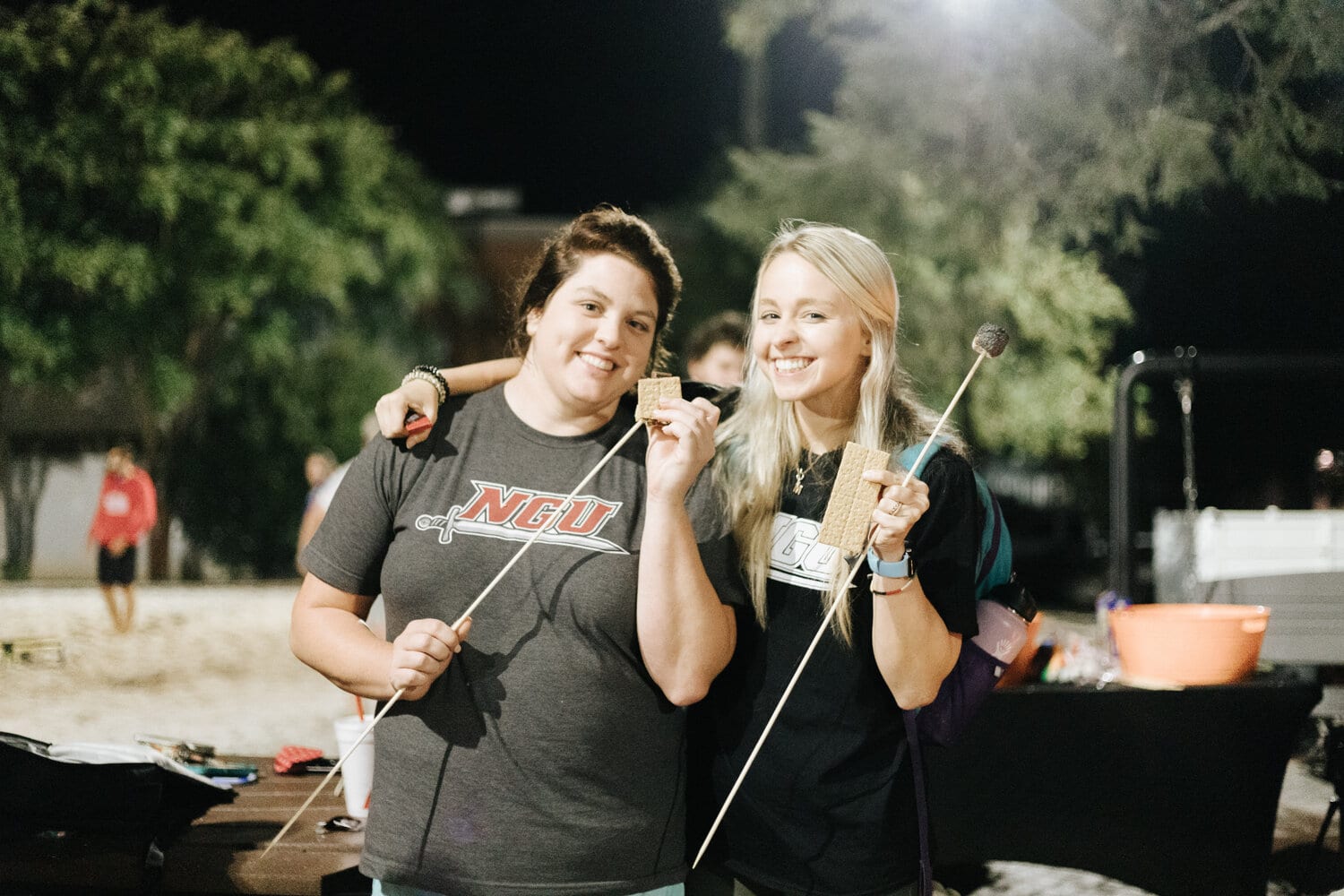 Homecoming also includes a lot of fellowship with friends and s’mores! Here, residents Christen Mahaffey and Mary Margaret Ellison are enjoying some s’mores.
