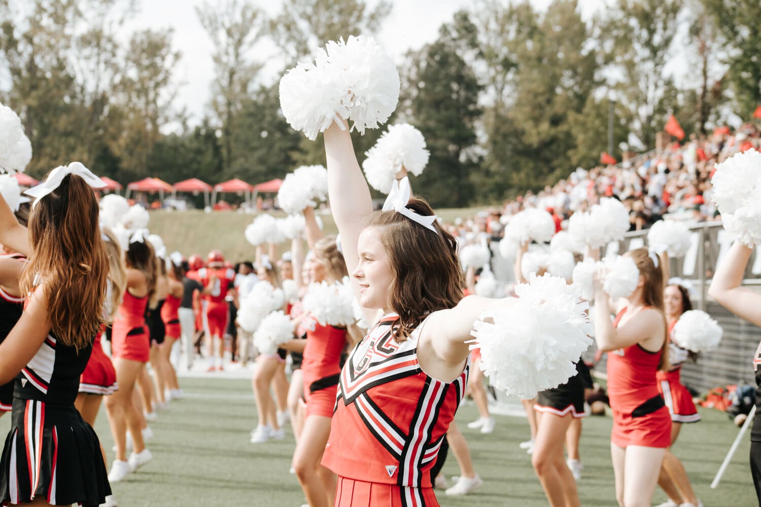 North Greenville’s cheerleaders cheered for our Crusaders on the sidelines for the first homecoming game in two years this past Saturday.