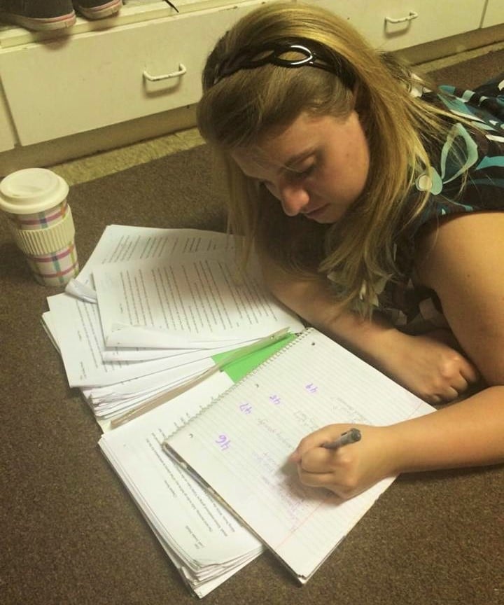 Leah Meahl found comfort on a floor to do some last minute studyng.