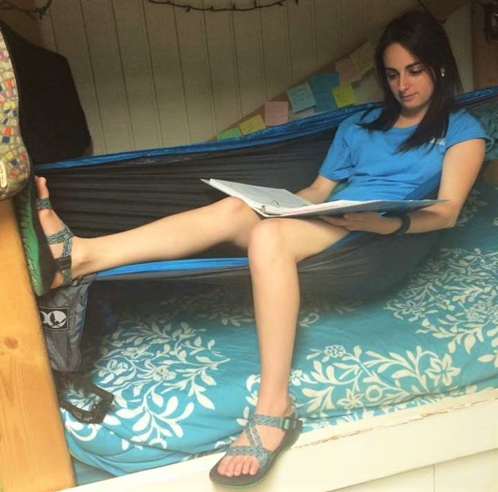Valerie Bostick relaxes in her eno while she studies.