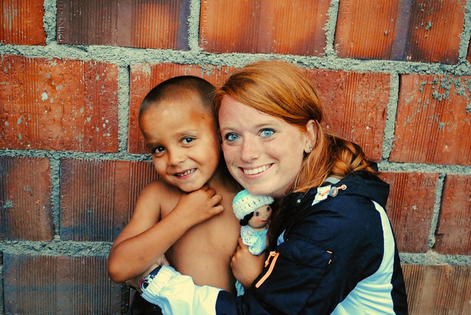  Kaitlyn loves on a Gypsy child in one of the villages she went to. 