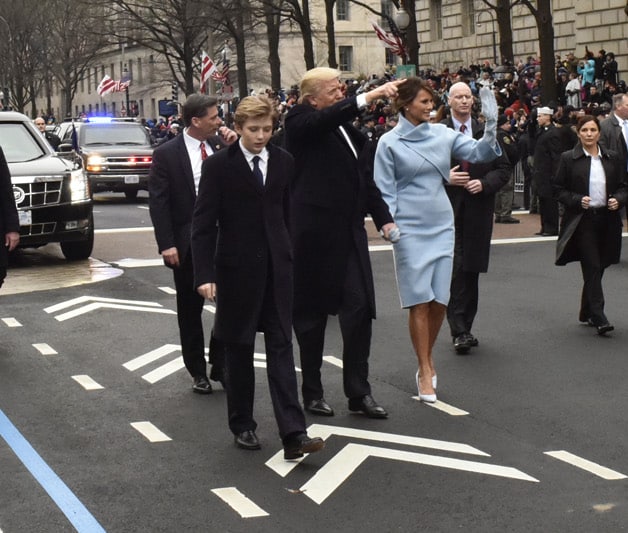 Barron Trump walking with President Trump after the Innauguration on January 20, 2017. Photo courtesy Wikimedia Commons.