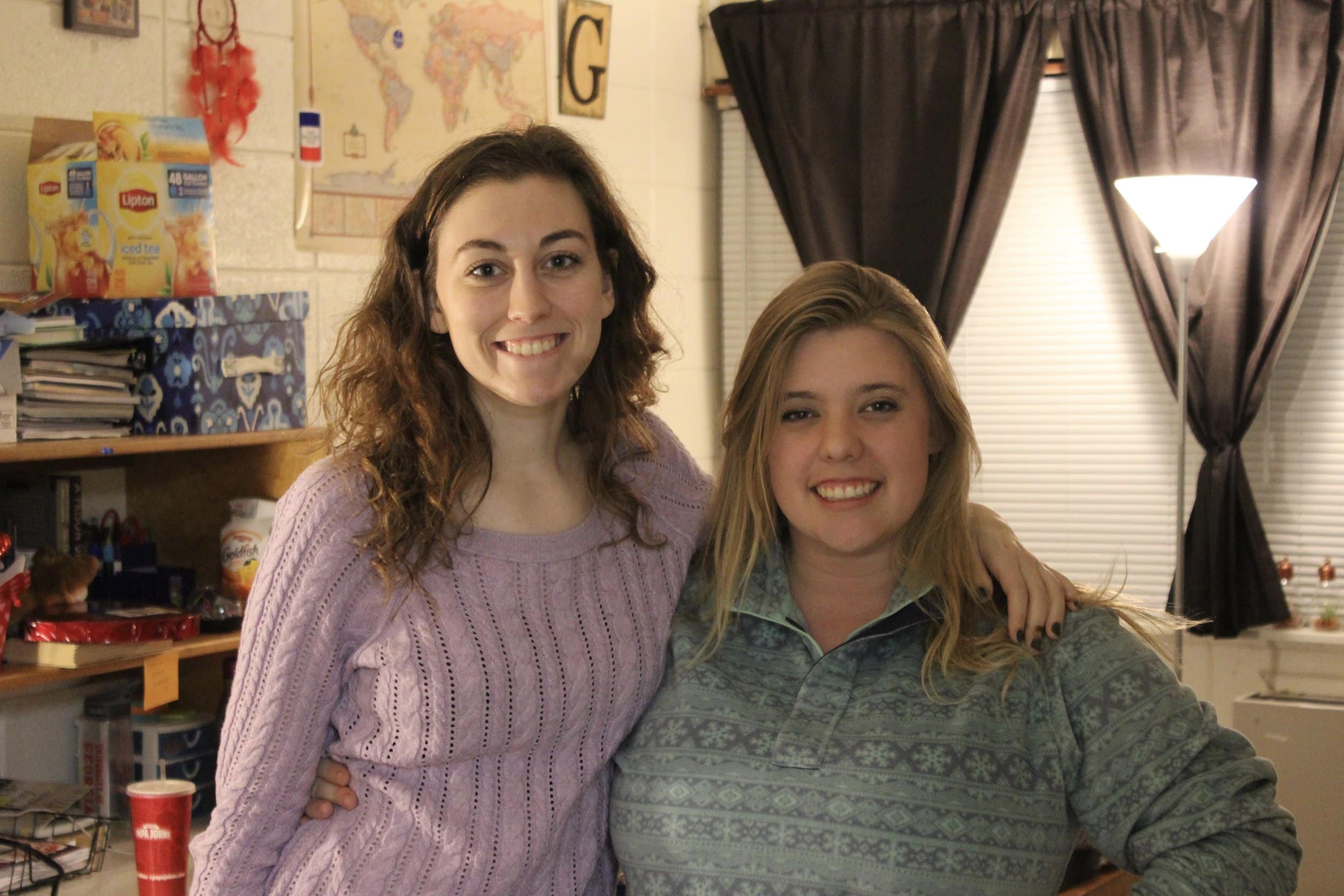 Anna Clair and her bestie Rachel Buko, both biology majors, waiti on more friends to arrive for open dorms.