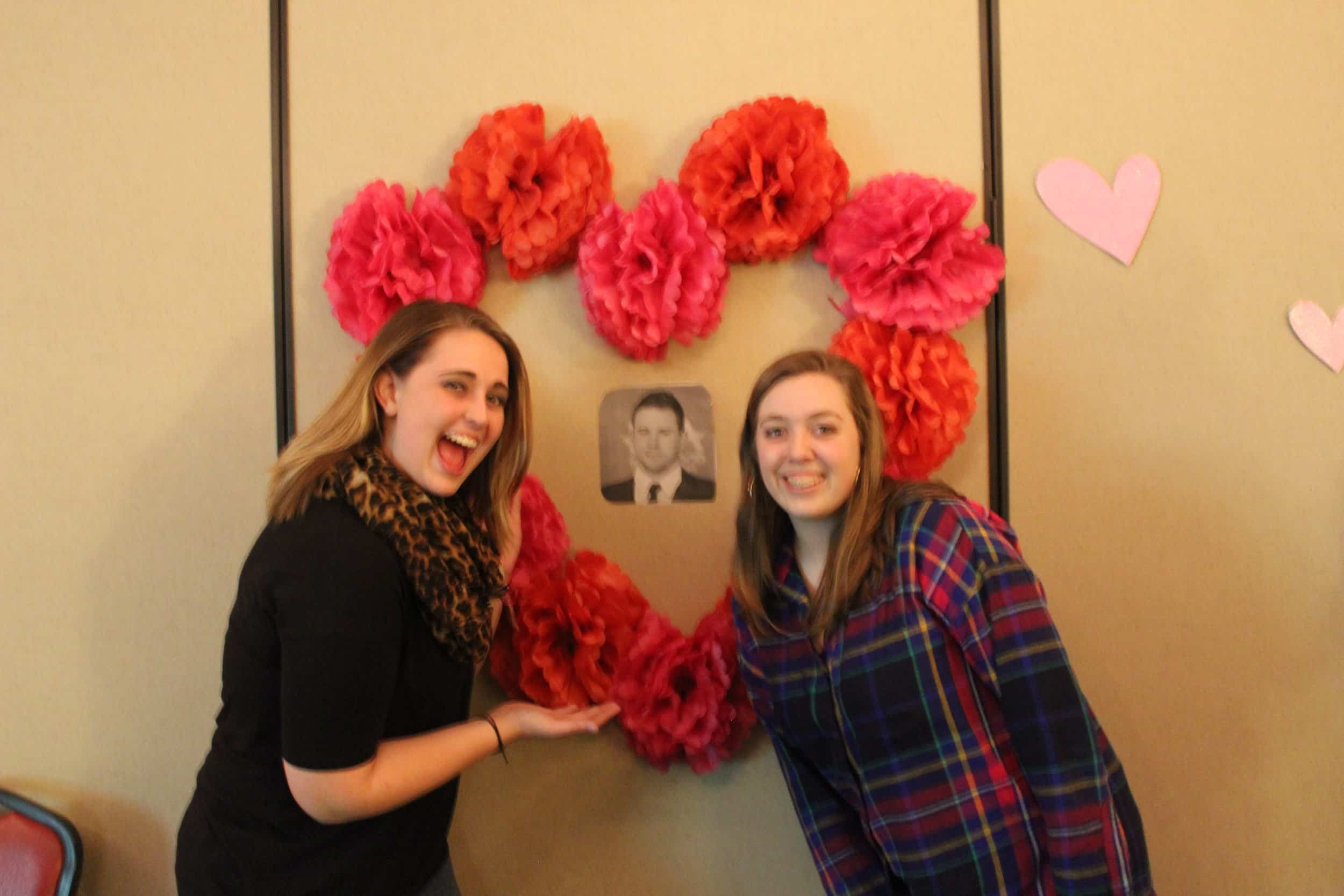 Kady Floyd, business administration major, and Morgan Bryant ,a CWAL major,&nbsp;admire the masterpiece.