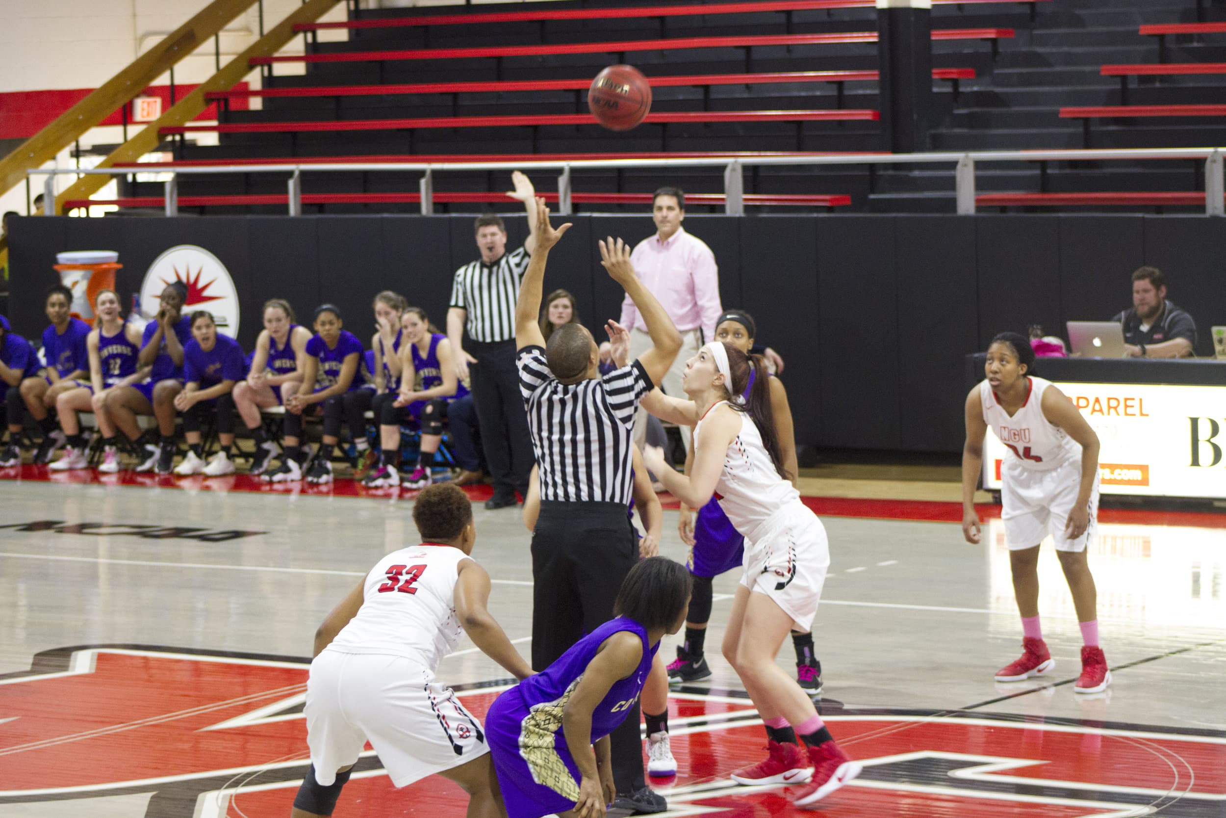 Elizabeth Trentham goes up for the ball at the tipoff of the Lady Crusaders' matchup against Converse College last Wednesday.