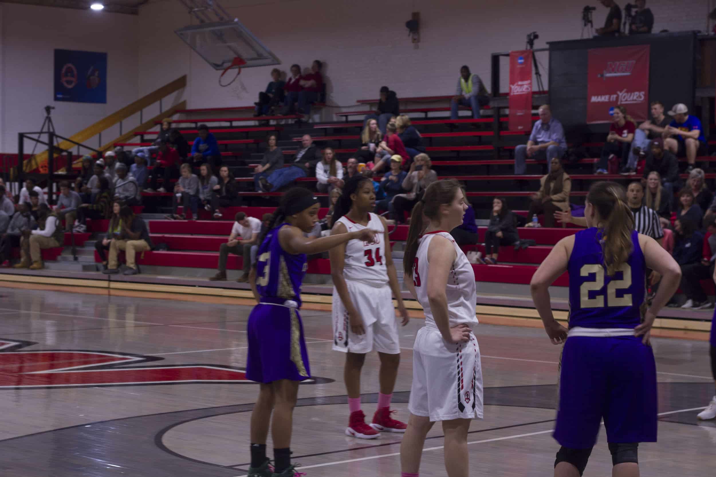 Senior forward, Alicia Jones (34), lines up to shoot a pair of free throws.