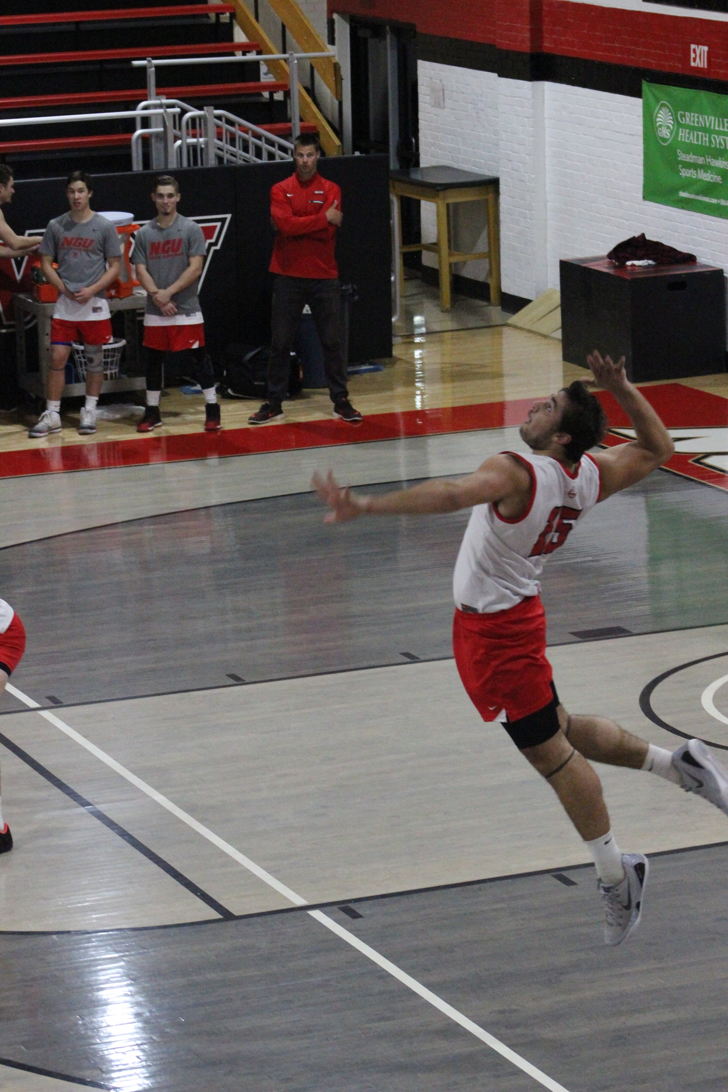 Number 15 Mathew McManaway starting the game with a powerful jump serve.&nbsp;