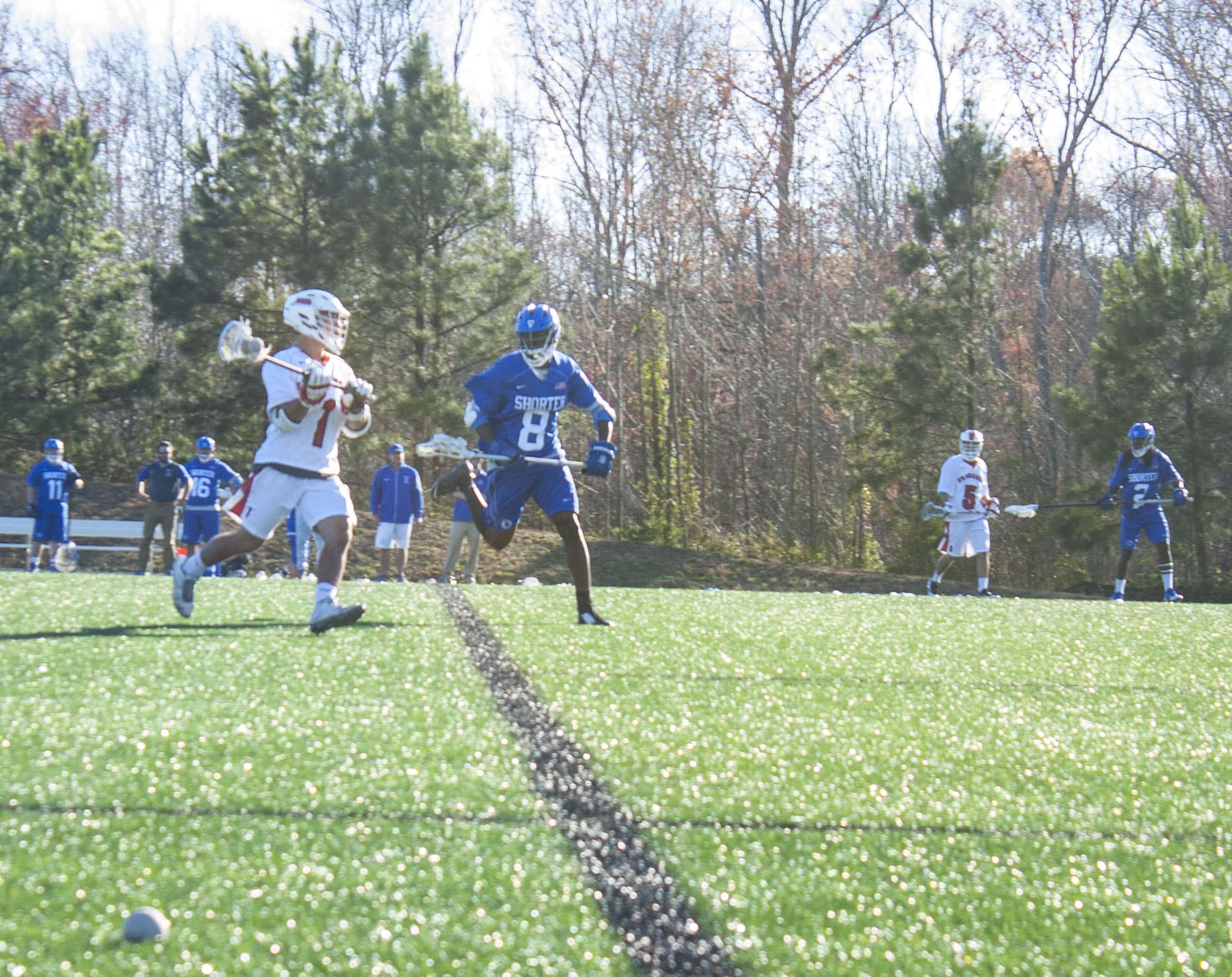 Hunter Burgett (1) tries to get past a Shorter defender Jaelin Morgan (8).