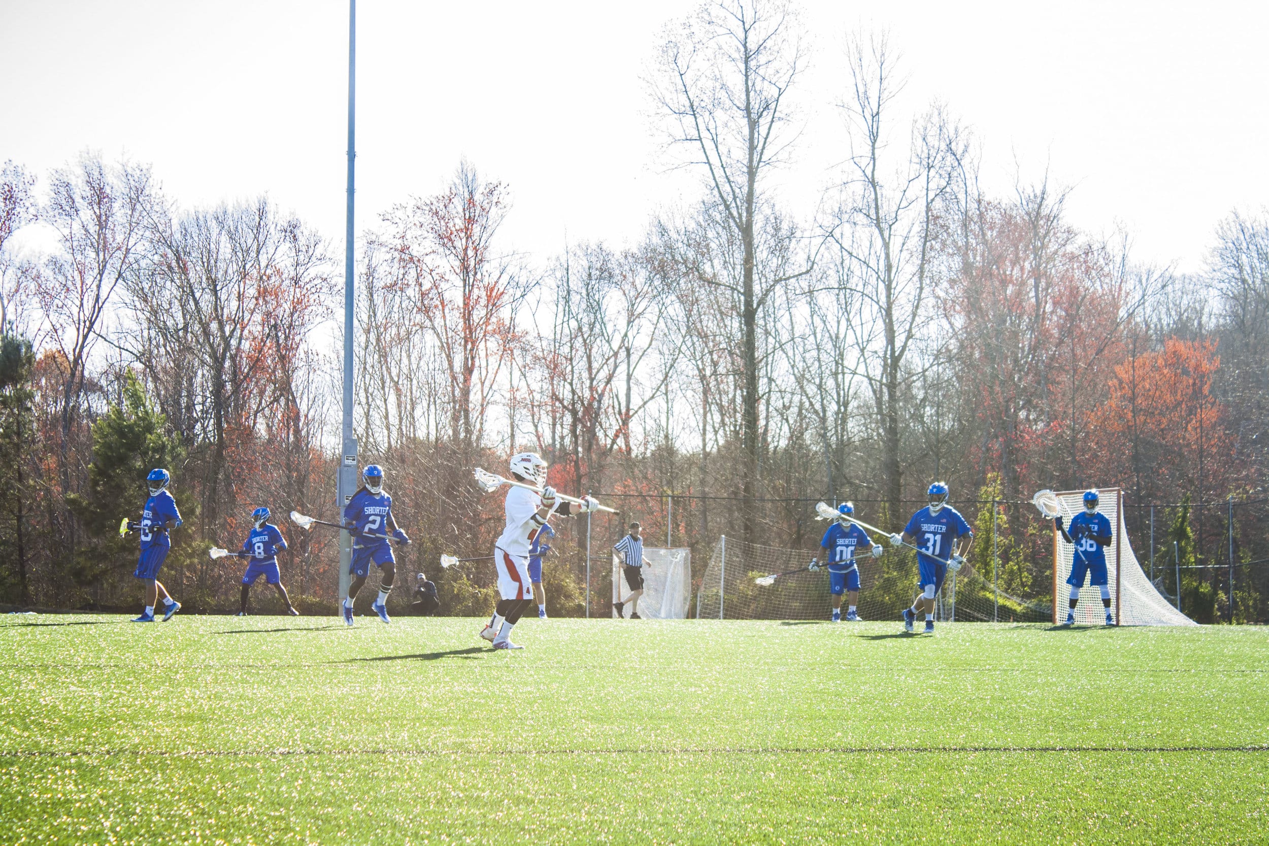 An NGU player surveys the field for an open teammate.