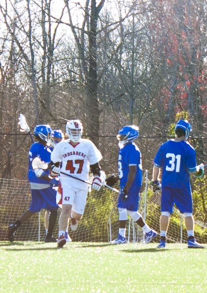 Freshman, Jake Foster (47) after scoring a goal.