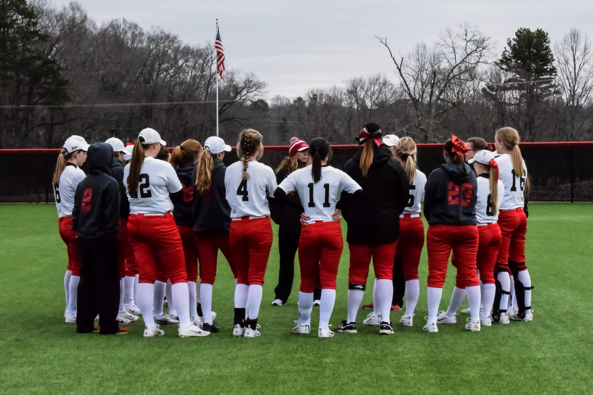 After taking a hard loss of 0-3, NGU's softball team huddles up and strategizes for the next game. Head Coach Sarah Hall gives encouragement and wisdom for what the team should do better next time.