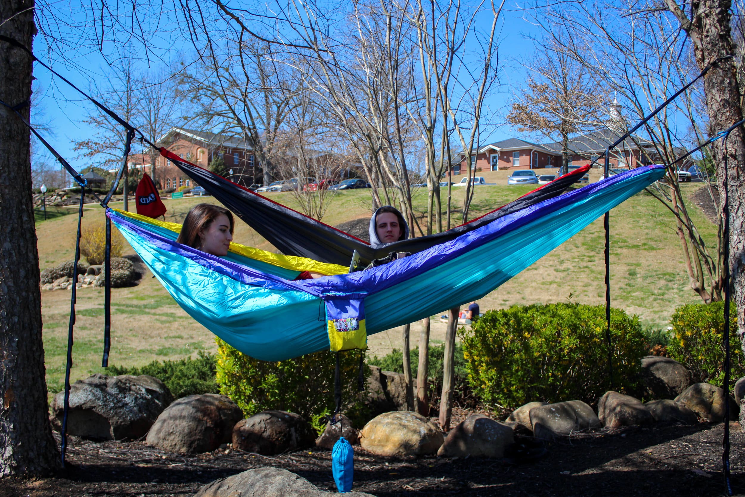 Junior psychology major Meghan Miller and junior marketing major Jordon Connor take advantage of the nice weather and study together in their enos.