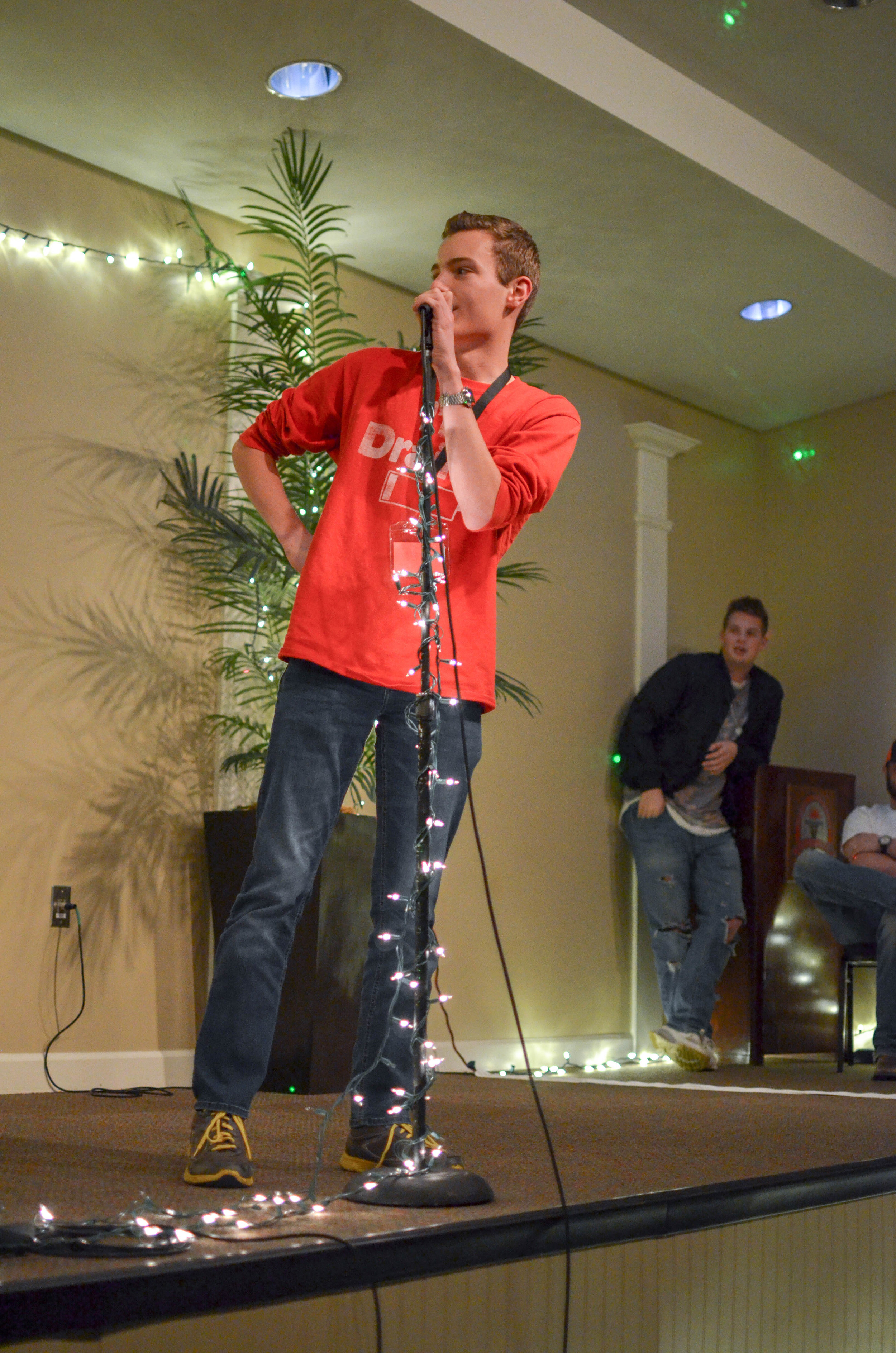 Landon Graber, an overnighter at NGU, performs standup comedy at coffeehouse.