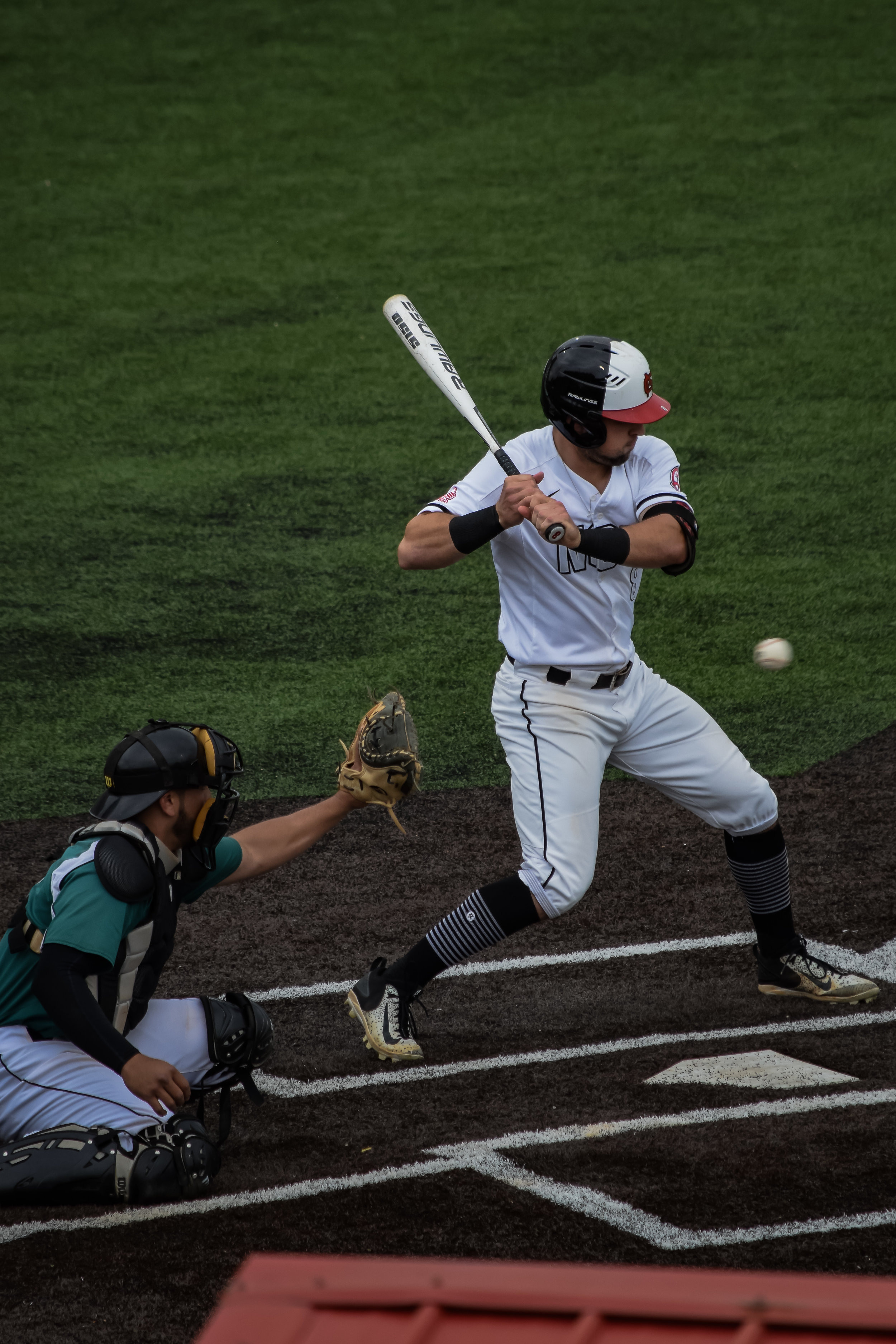 Josh Black leans back to keep the ball from hitting his side.