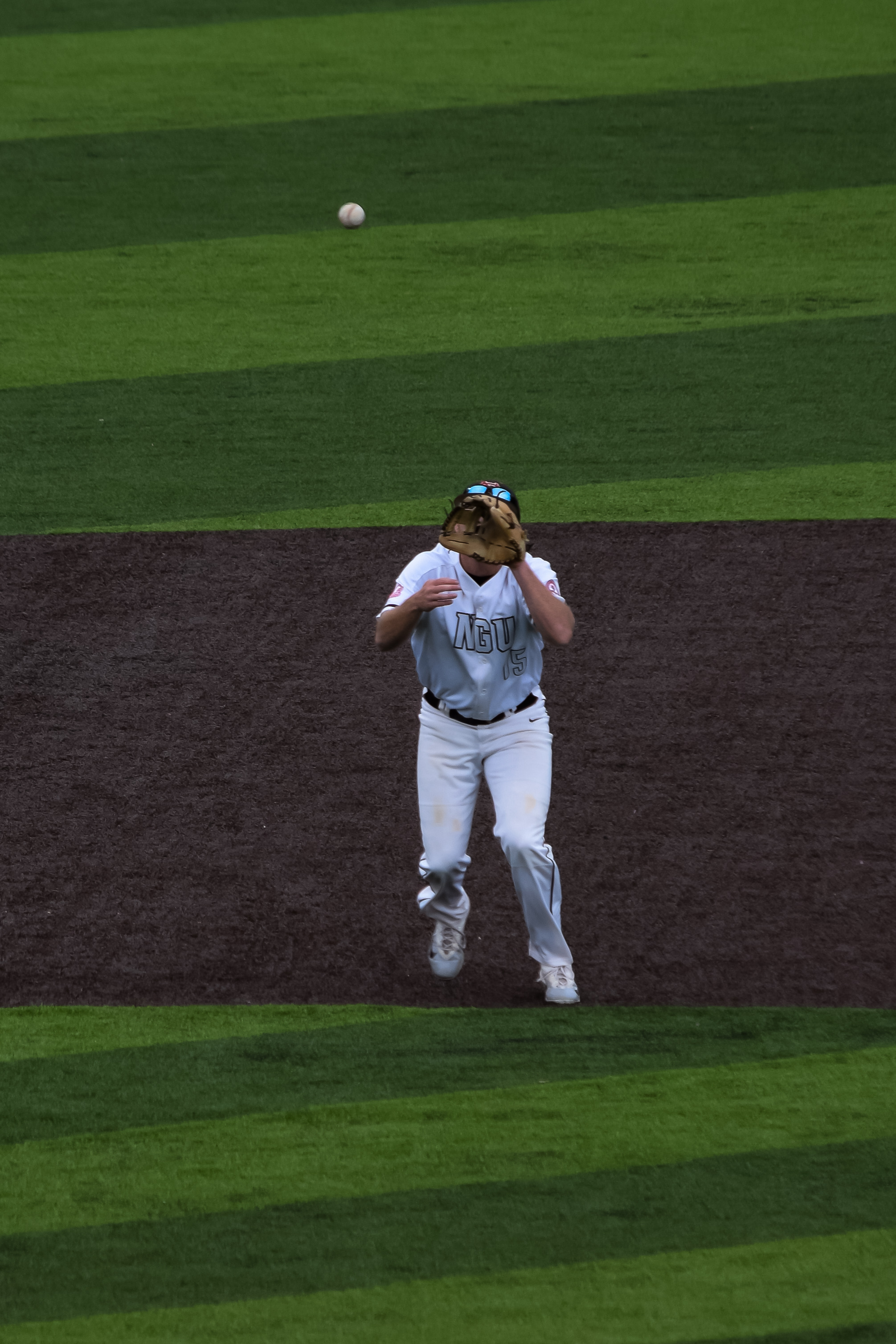 Eric Gilbert lines up his glove with the ball to get another out.