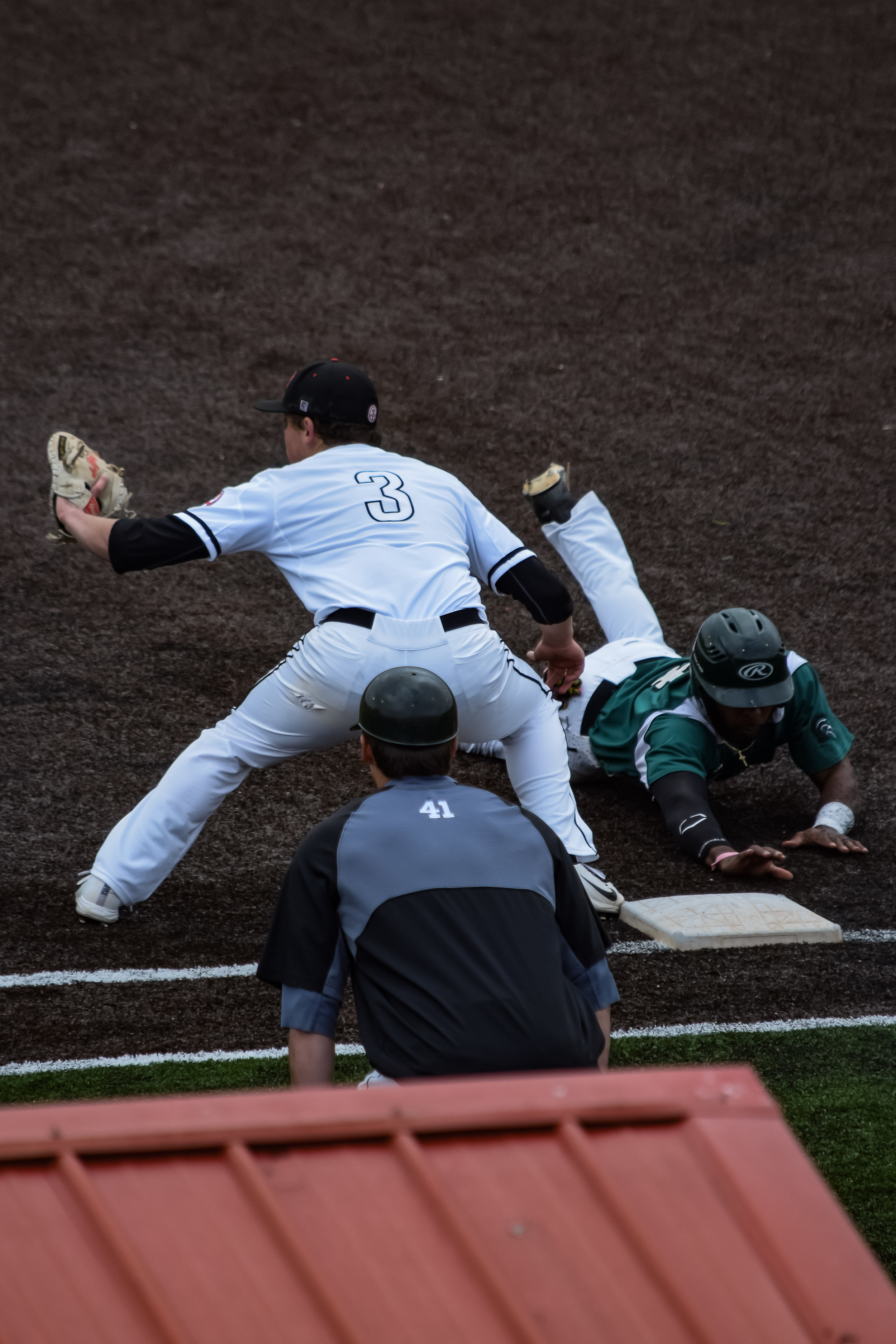 Brown gets prepared to catch the ball to keep the opposing team from getting a steal.