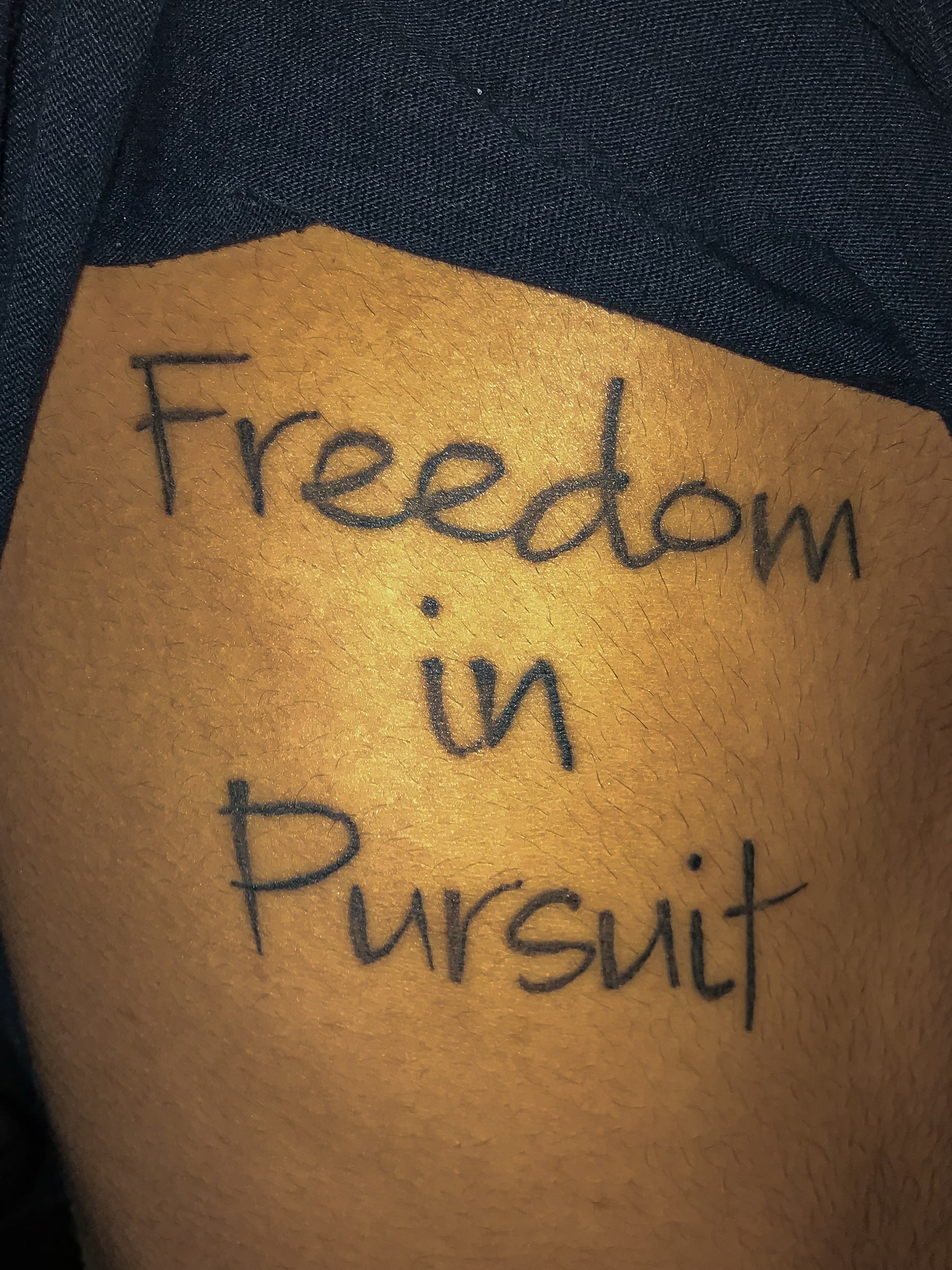 This is Isaac Langdon. Landon got this tattoo after feeling in bondage in sin that was weighing him down. After a weekend trip with a friend, Landon realized what freedom in pursuit truly meant. When Landon pursued the Father, he was able to find fr