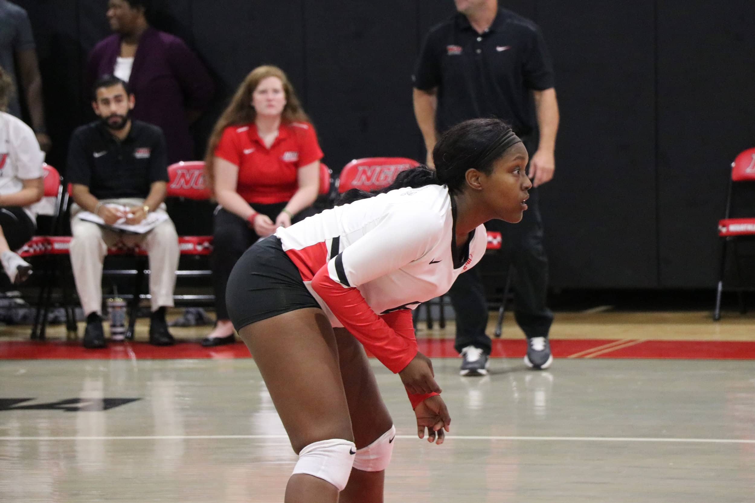 Senior, Johna Robbins (6) gets ready for the ball to be served.