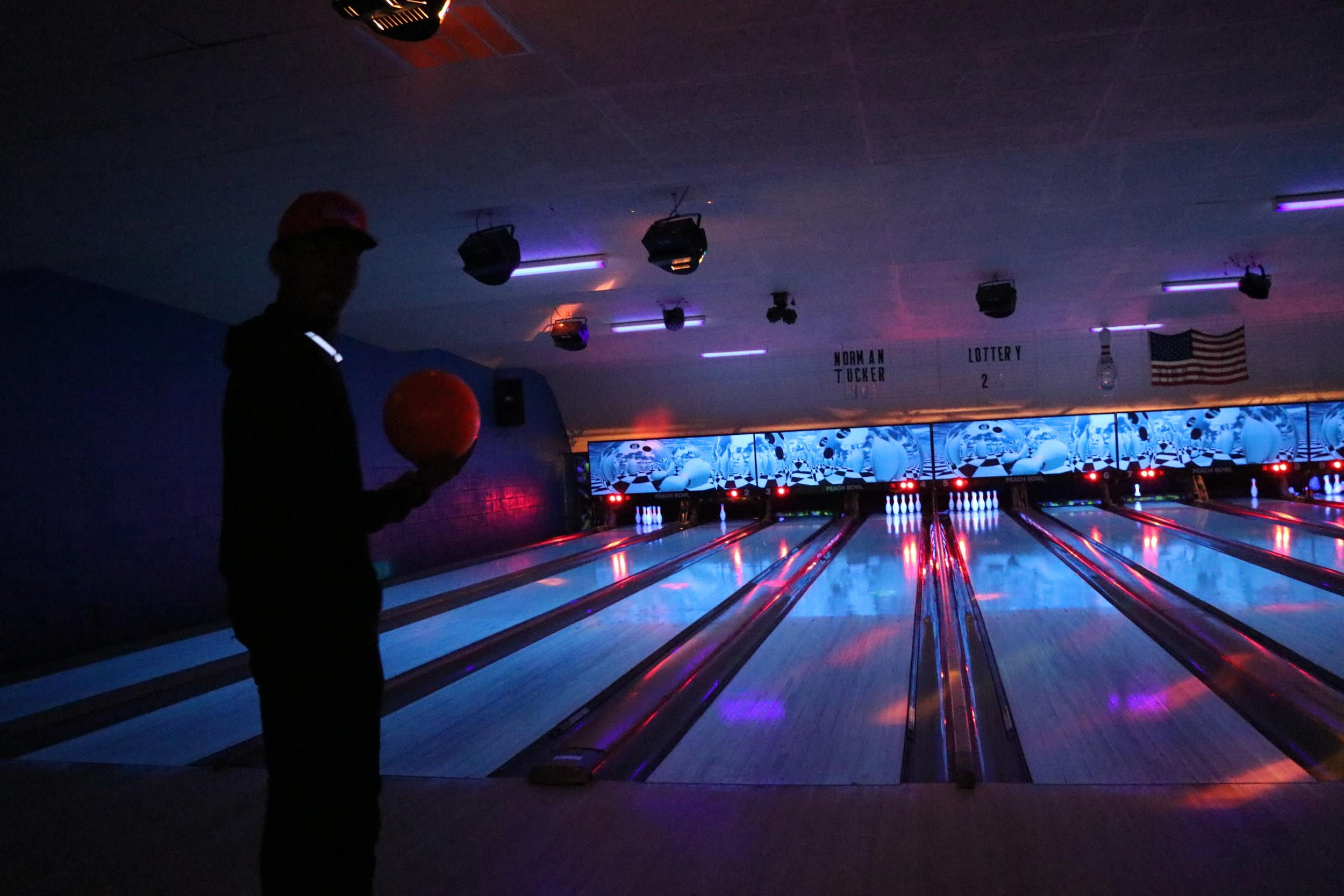 Sophomore, Zion Dendy, gets ready to bowl as he pauses to gain concentration on the game.