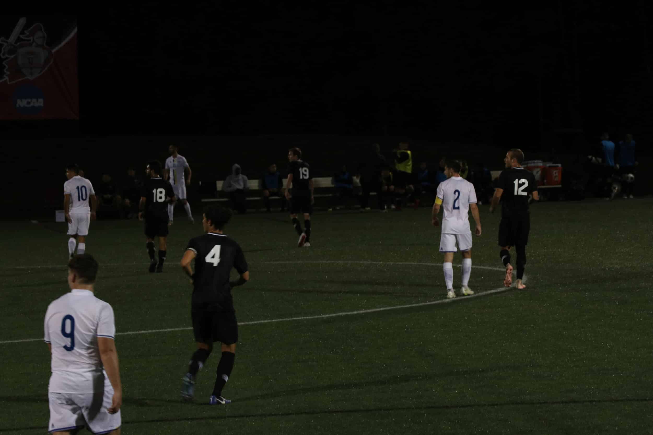 Marlon Evans (4) senior, Gus Johnson (12) sophomore, James Segovia (18) junior and Jake Quinn (19) senior, get ready for the ball to come their way.