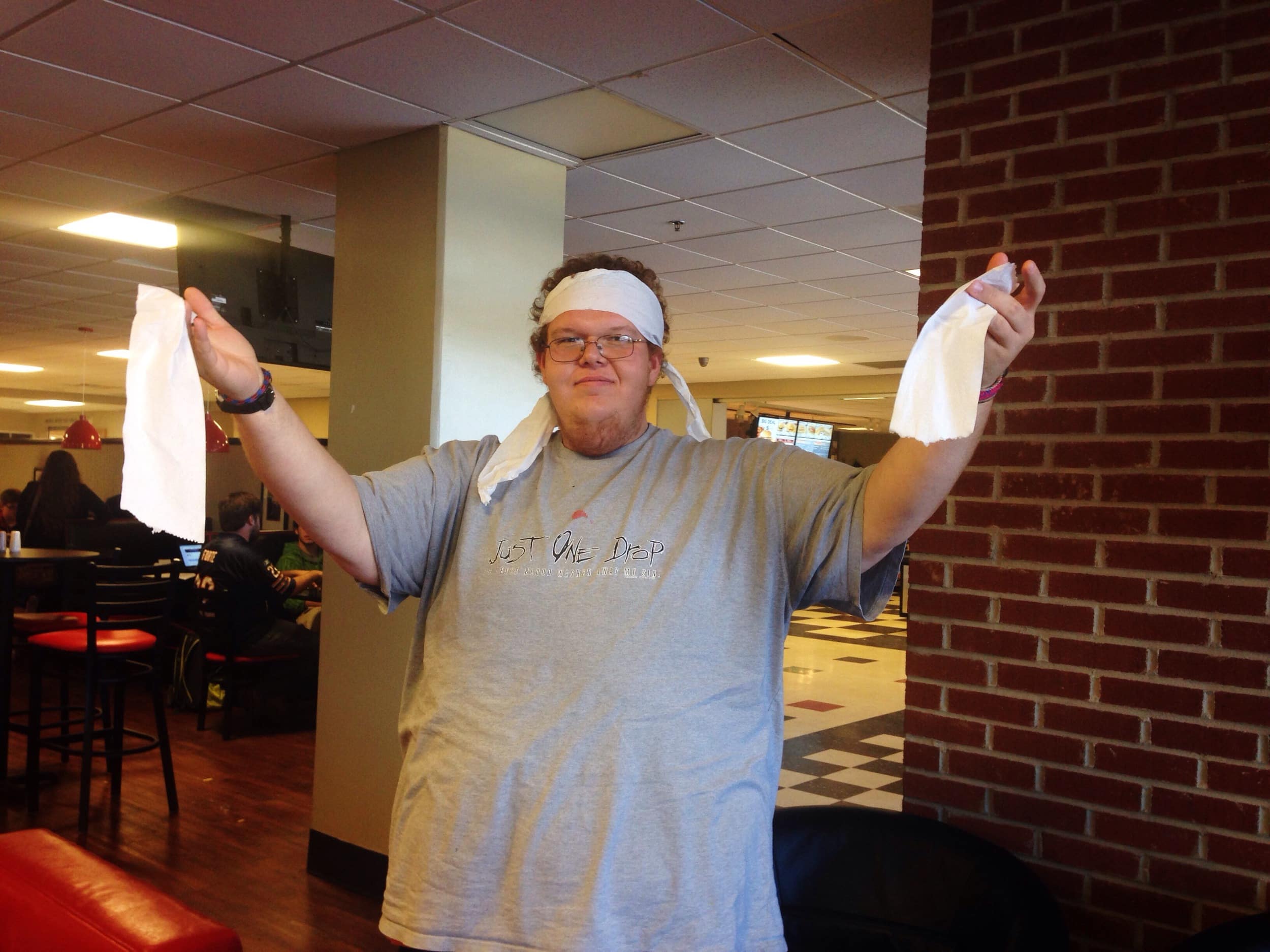 TomTom Grindell indulges himself in some festive toilet paper attire.&nbsp;