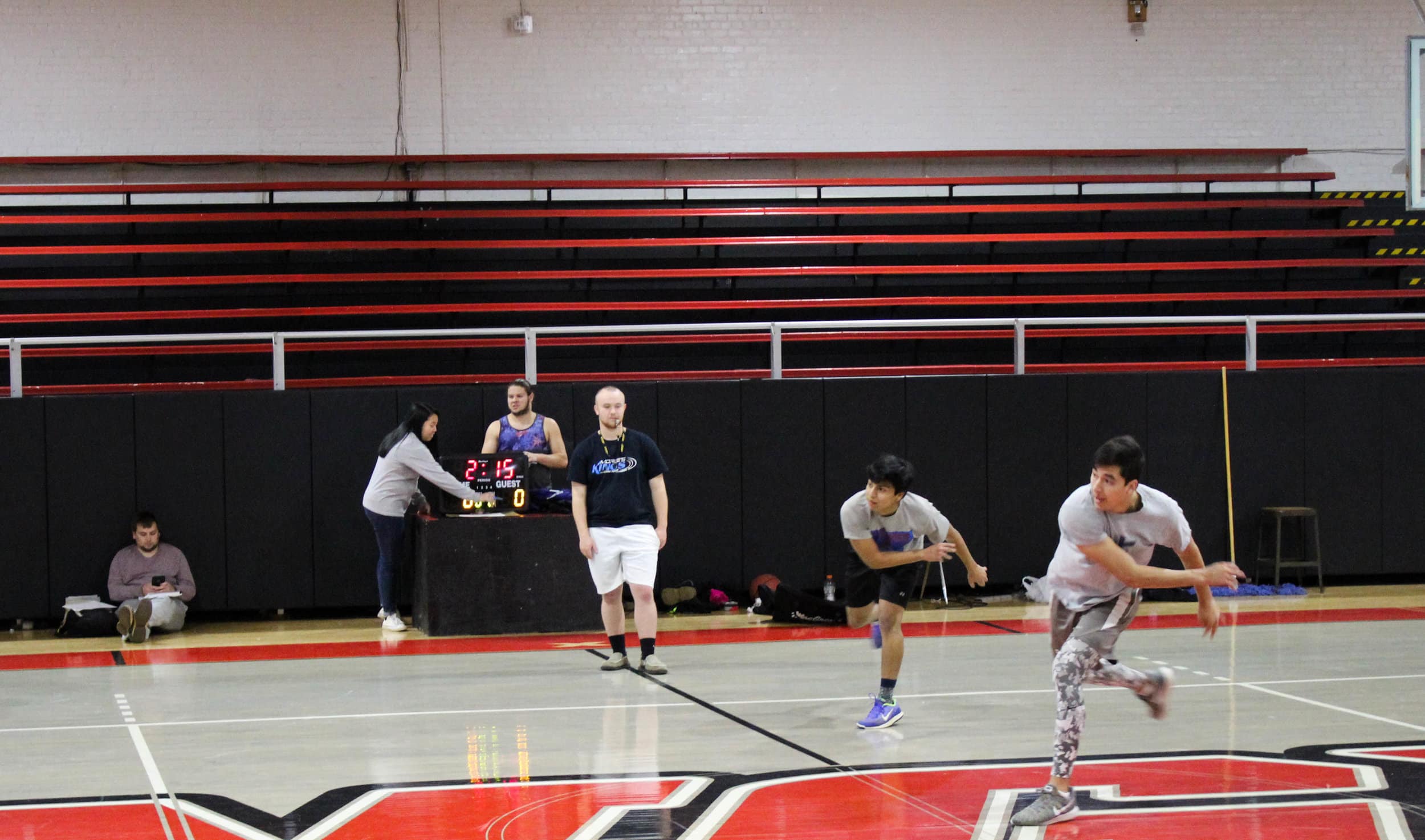 Freshmen Joseph Castillo and Jason Waffles from The cool guys throw the balls in sync aiming to get the opposing players out.