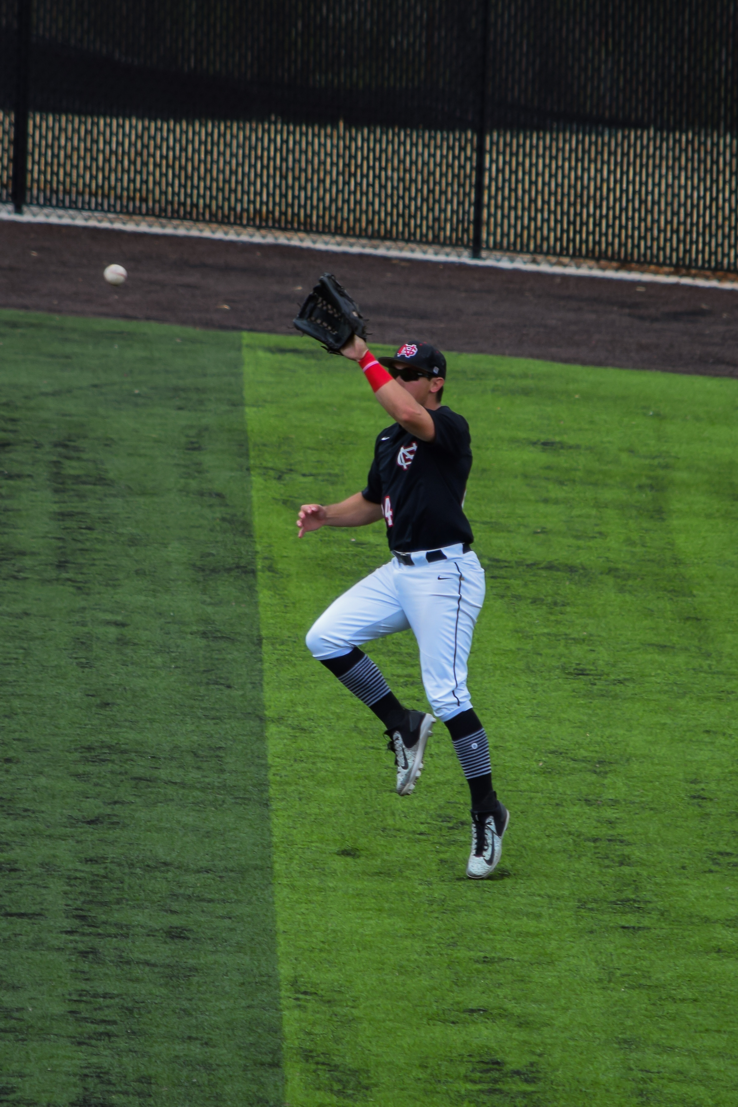 Chandler pulls off another amazing play as he catches another pop fly in the outfield.