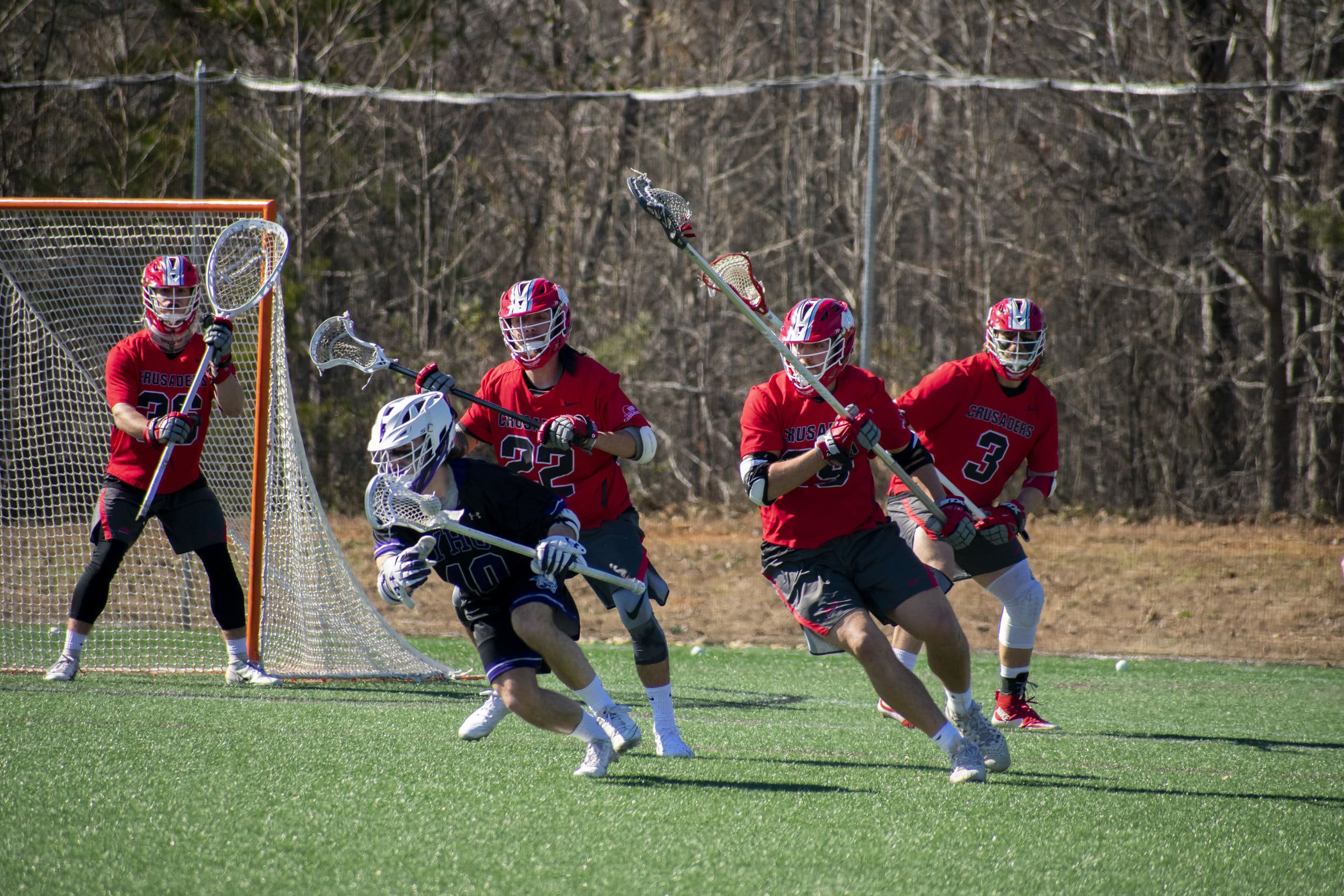 Lanzillo, Senior Hunter Crandall (32), and Senior Sky Dupree (3) are determined to steal the ball.