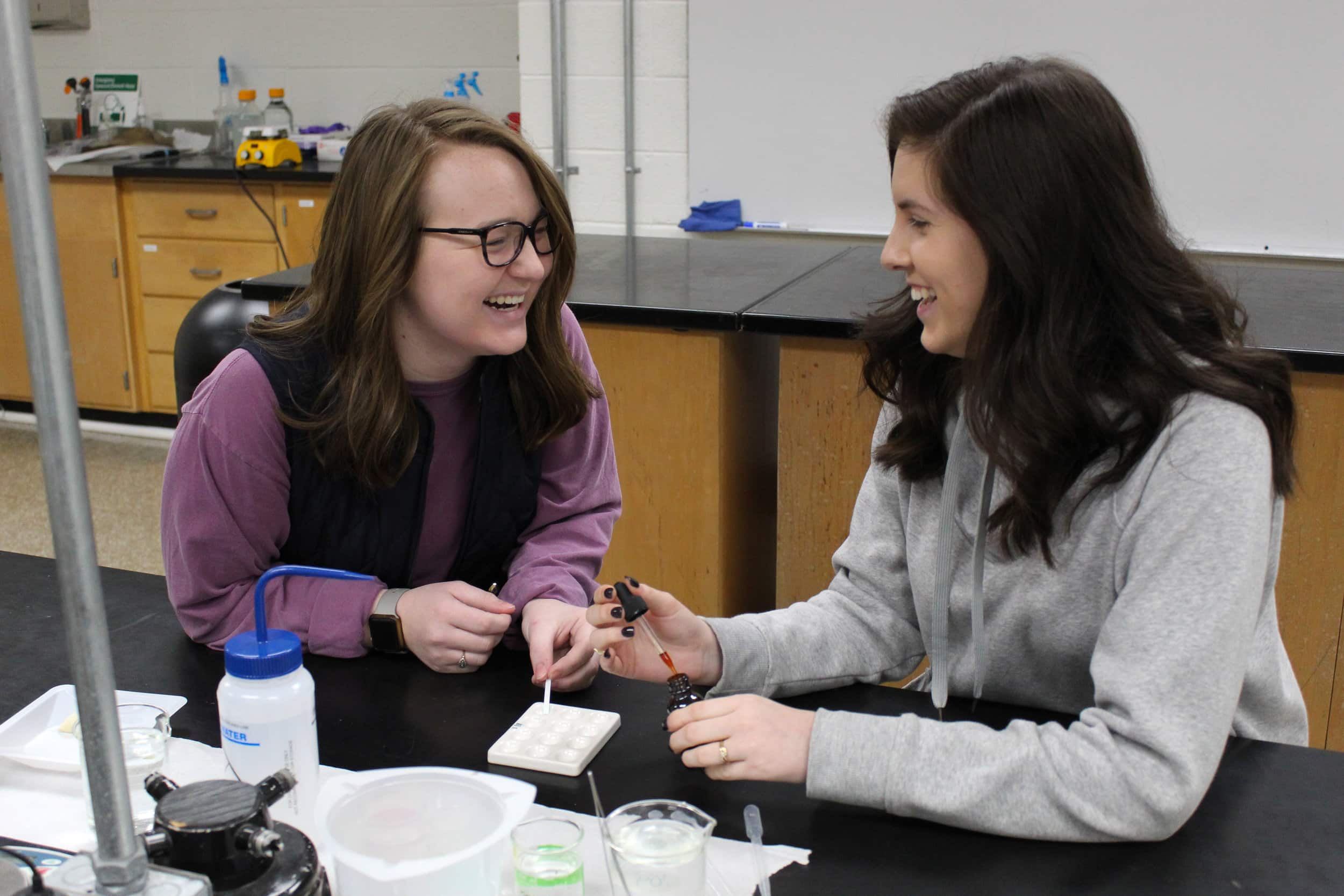 Biology Major Juniors Natalie Minor and Mattie Sullivan prep for their lab.