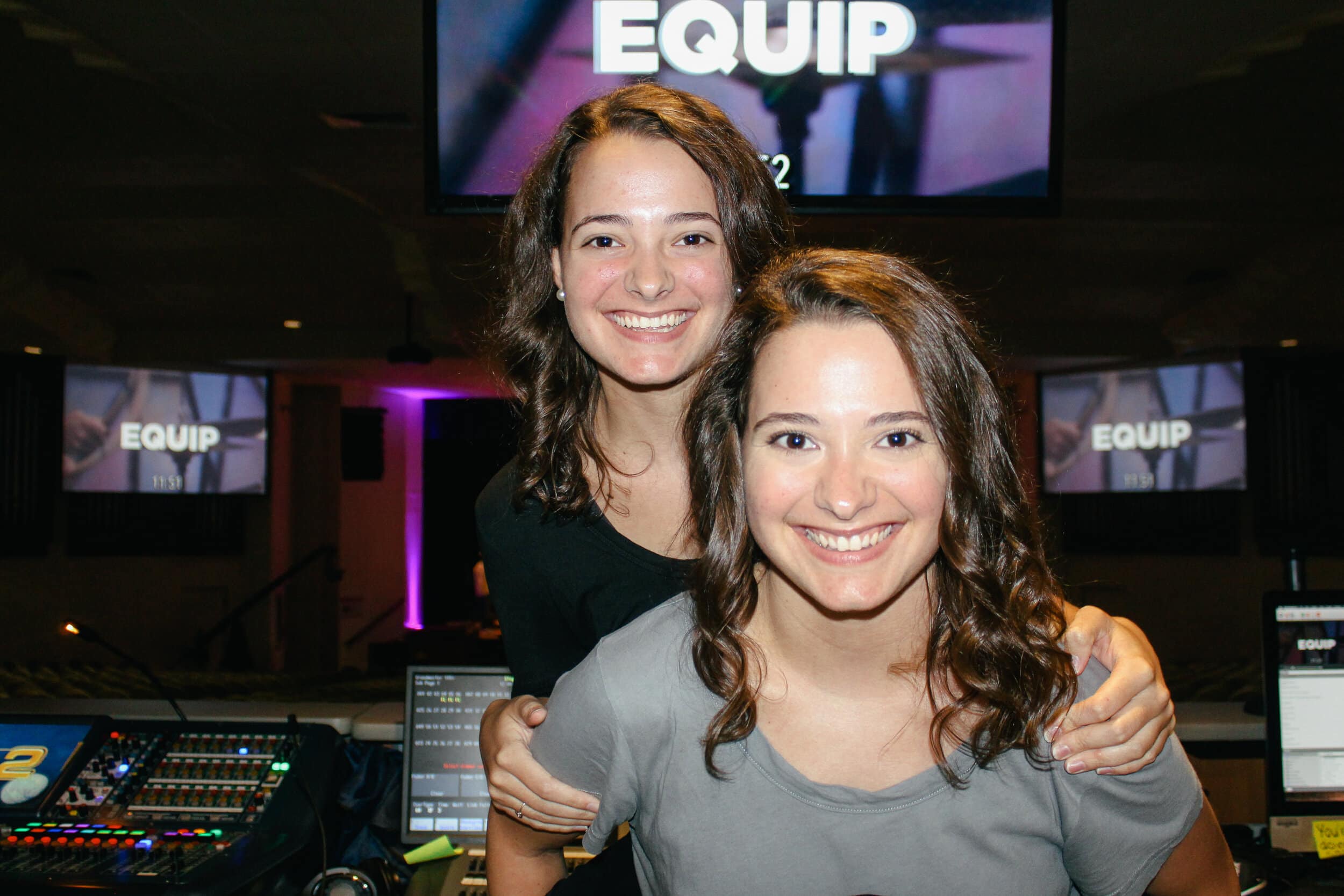 Senior broadcast media major Rachel Daniel and senior digital media major Nicole Daniel smile as they are preparing to work with Media Team for BCM.