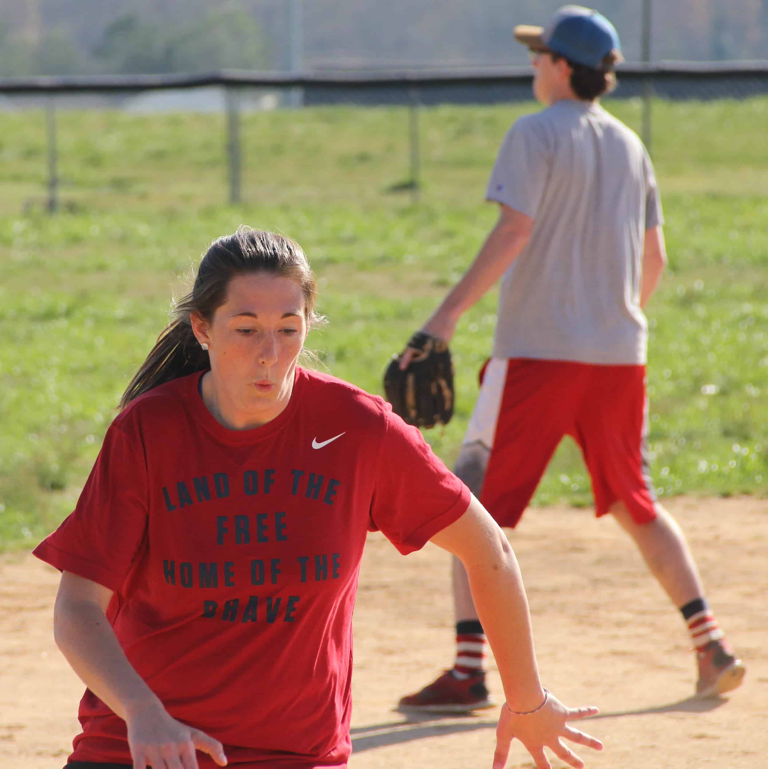  Mackenzie Shellnut sprints by third base. 