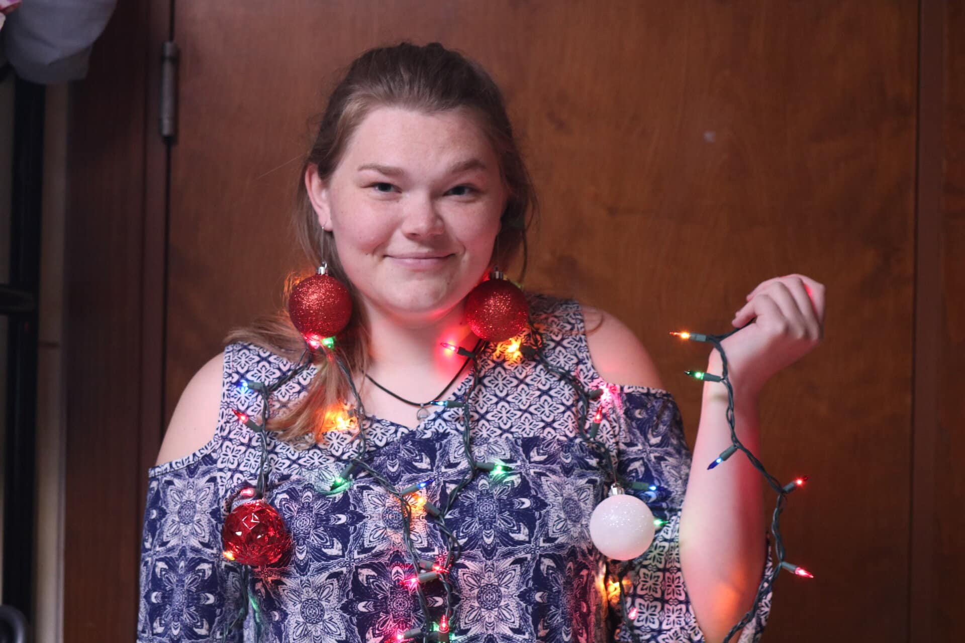 Sophomore music education major Caroline Whilden even let her roommate decorate her with Christmas lights and ornaments.
