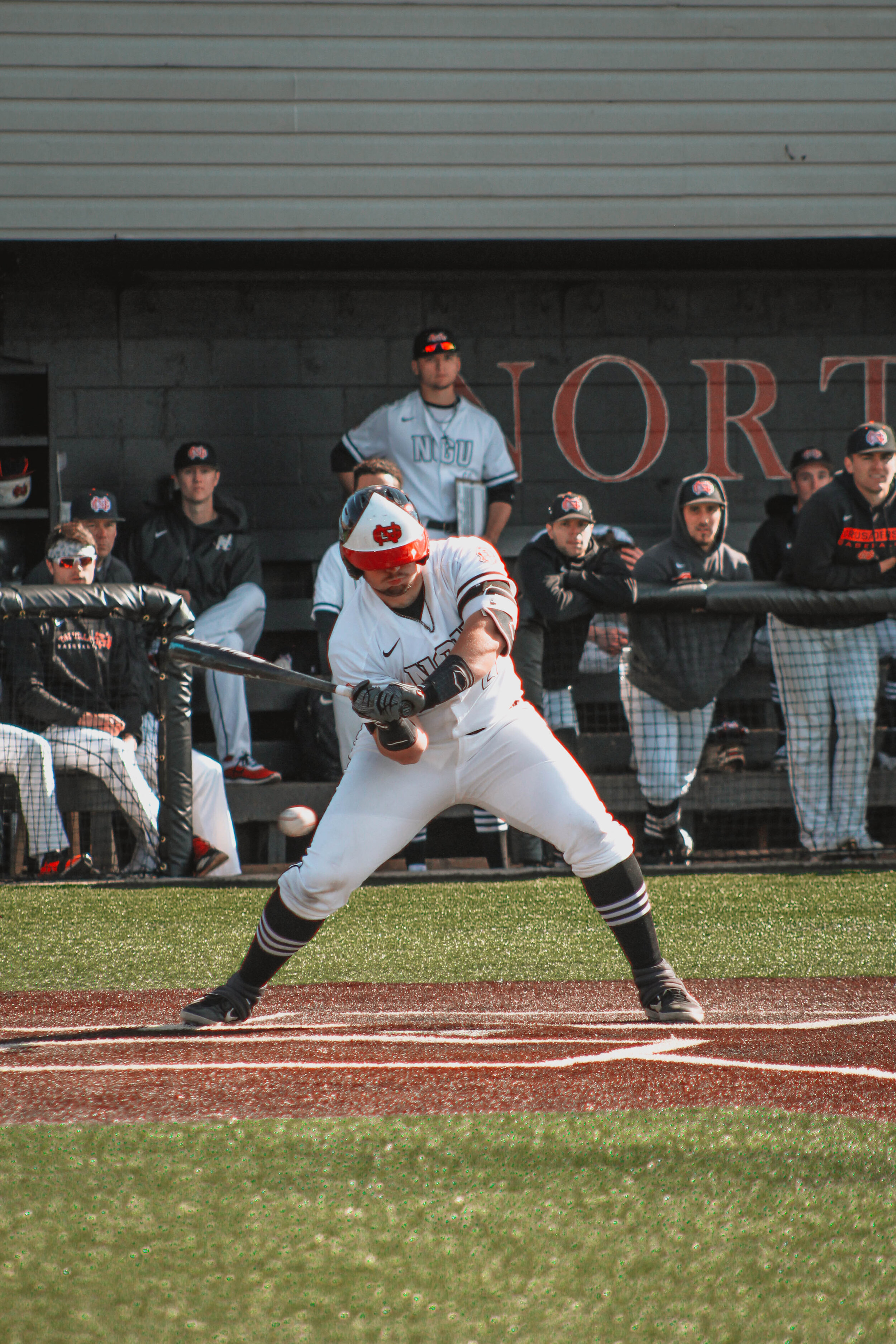 Jordan Holladay (21), a junior, hits the ball.