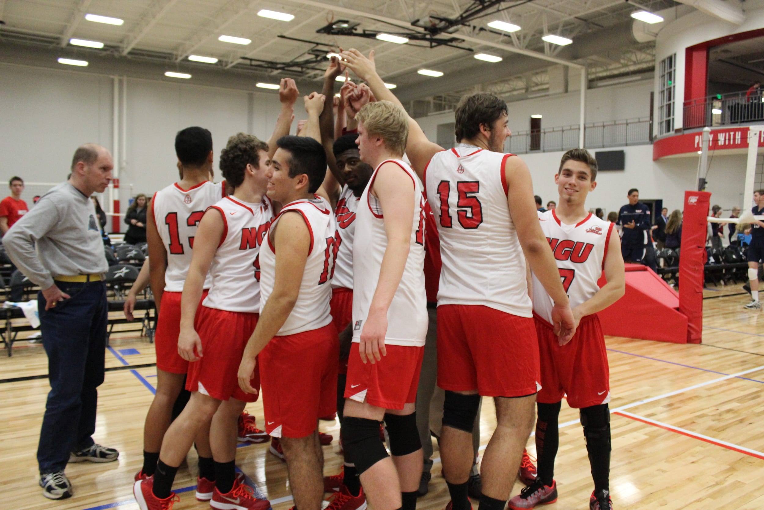 North Greenville&nbsp;Men's Volleyball team gathers around before the start of a match.Photo by Andrew Stevens