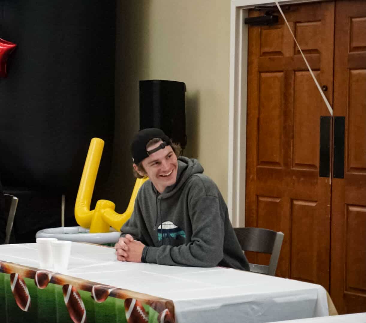 Junior Drew Reynolds gets ready to start the wing eating competition.