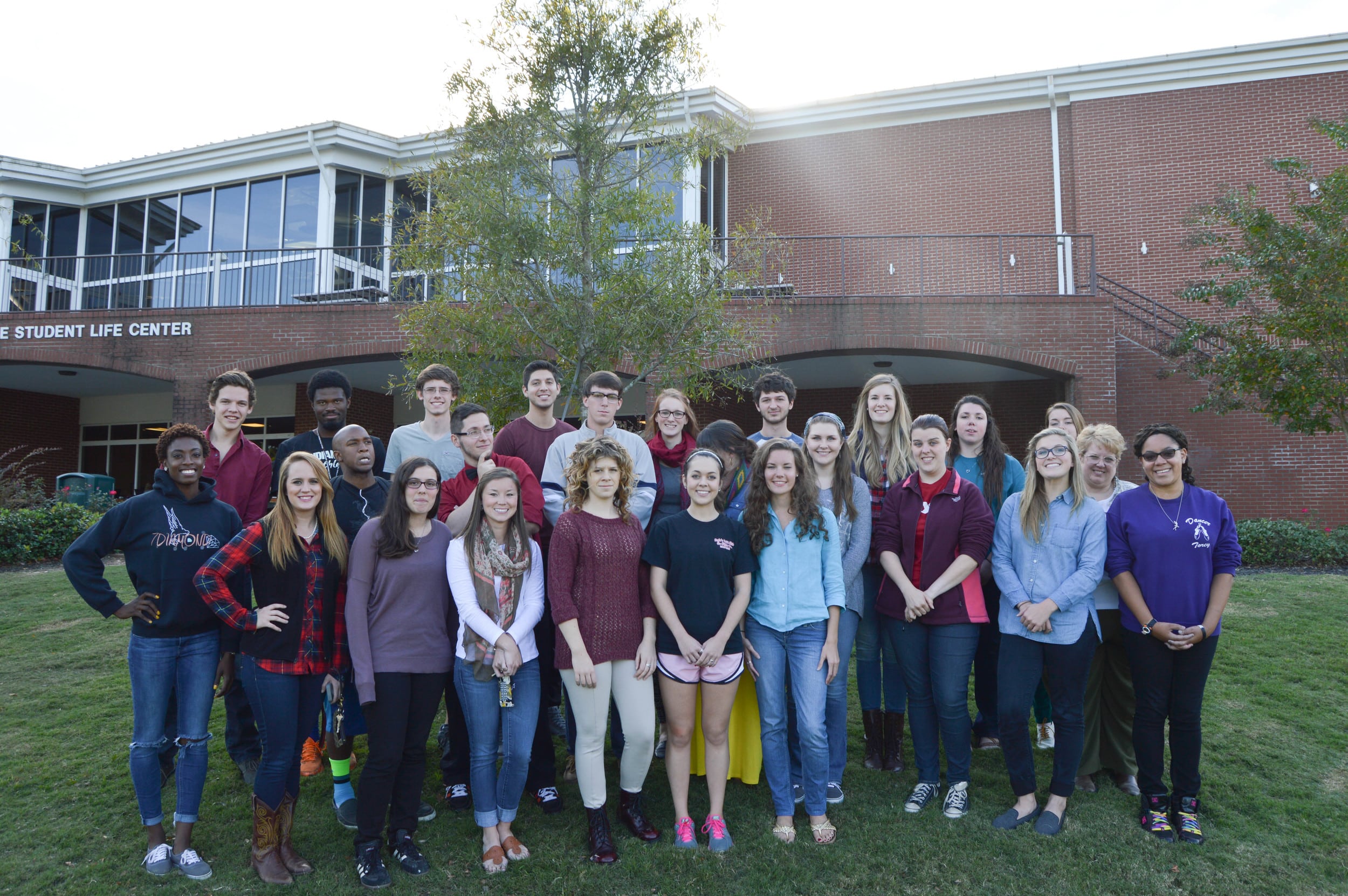 The staff of "The Vision Online," "The Vision Magazine" and "The Vision Annual" pose for a group picture during the Fall 2014 semester.