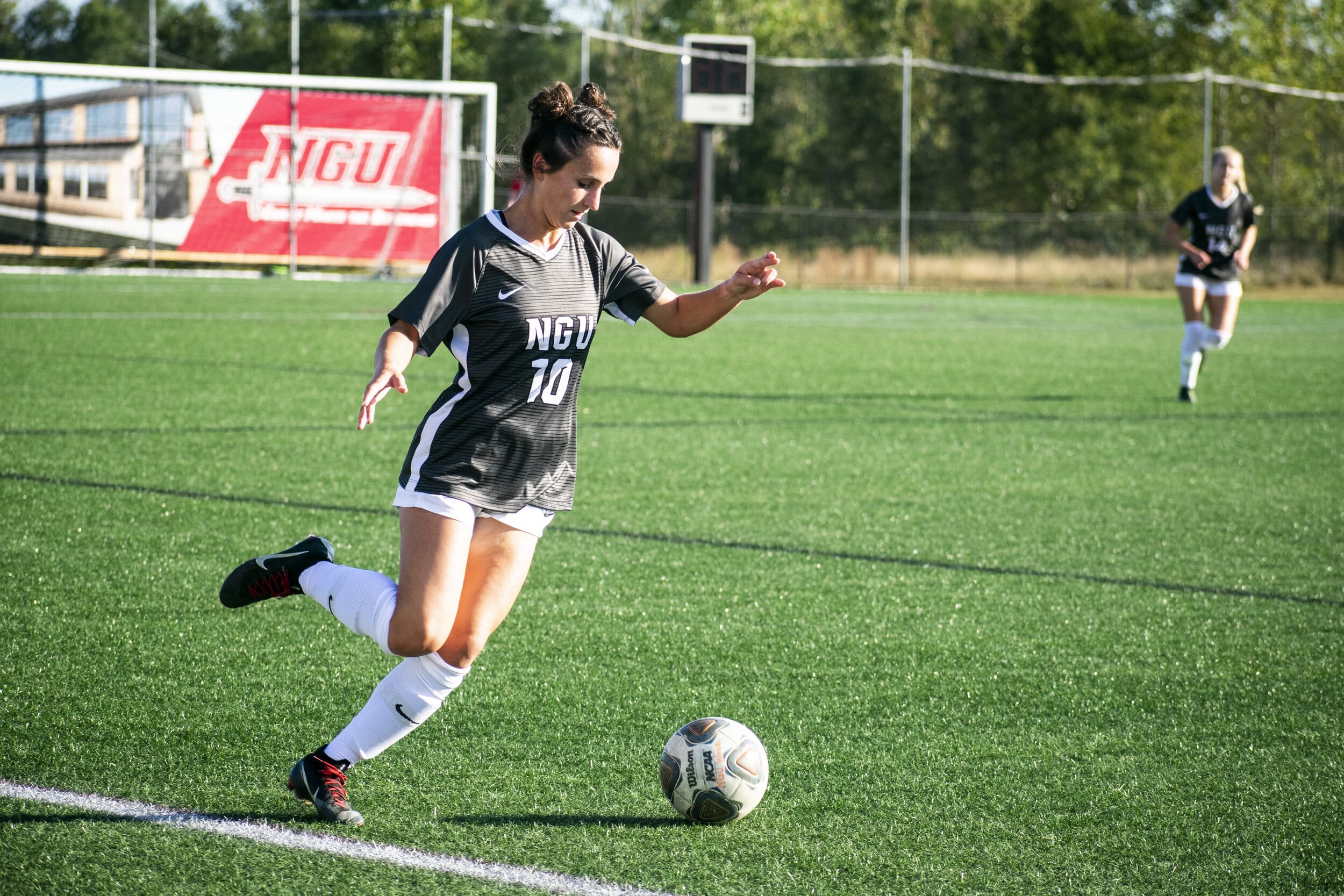 Freshman Ryan Kite (10) kicks the ball.