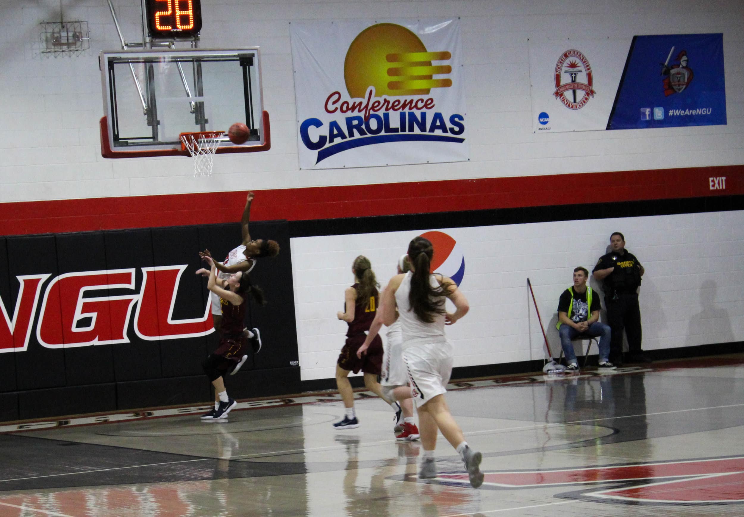 After getting a fast break down the court, Savannah Hughes (21) goes up and makes a layup.