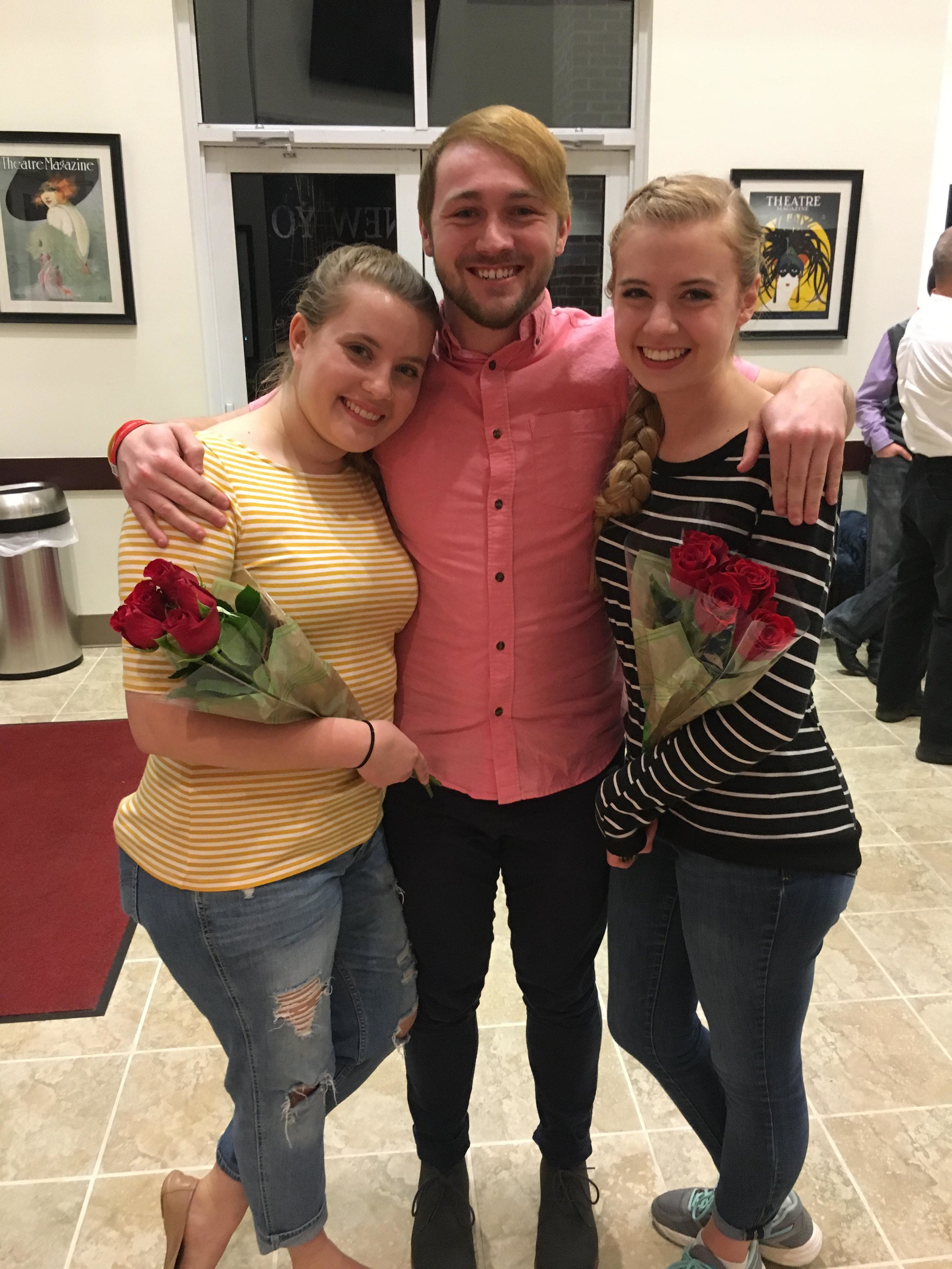 From left to right: Freshmen Marlee Daniel, senior Landon Toney and freshman Abby Gilbert posing with their biggest fan after their performance.&nbsp;