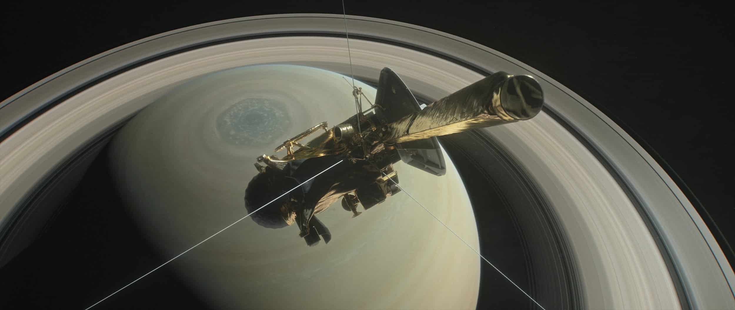 This digitally created image shows NASA's probe Cassini flying high over Saturn.Photo courtesy of NASA.