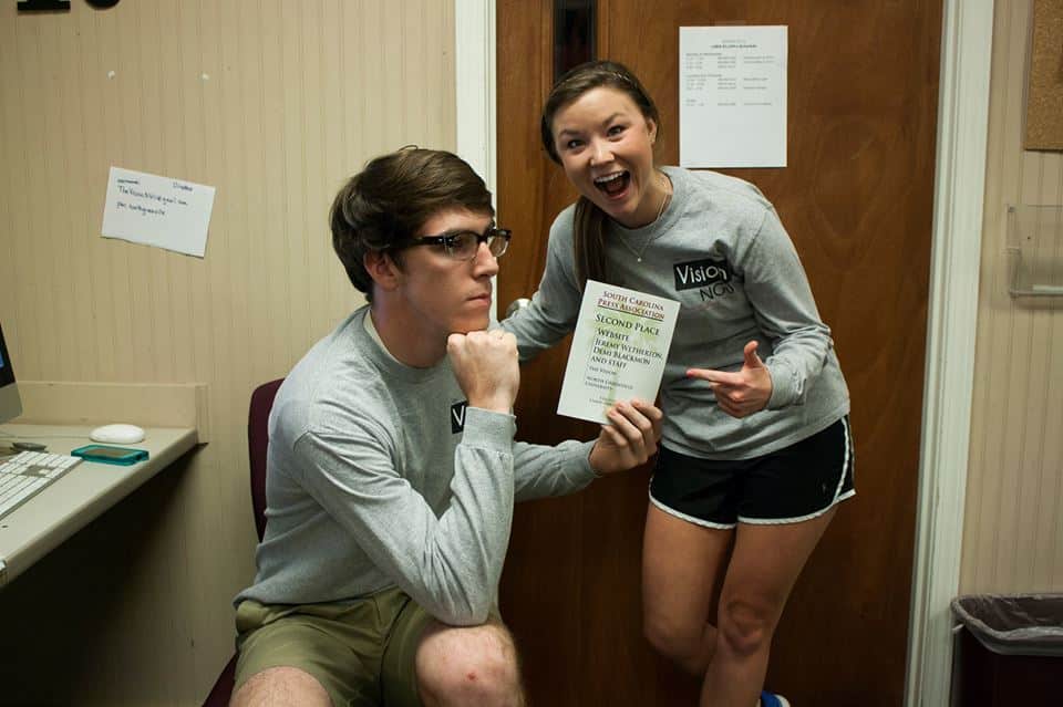 Photo Courtesy of Abigail Tinker.Editor-in-Chief Jeremy Wetherton and Managing Editor Demi Blackmon celebrate the award they accepted on behalf of The Vision website.