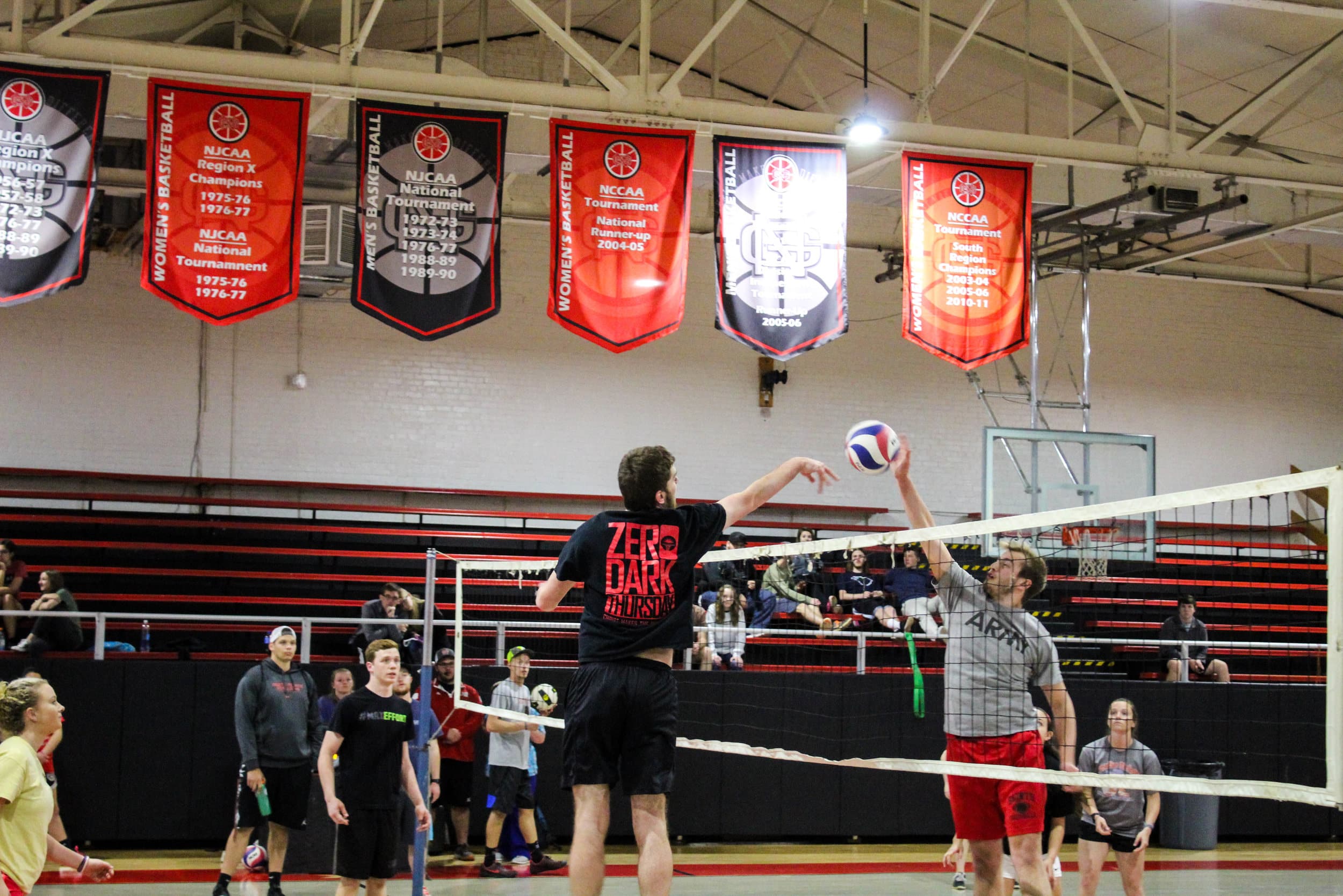 Ross Smith hits the ball back over the net after it was spiked by a player from The Empire Spikes Back.