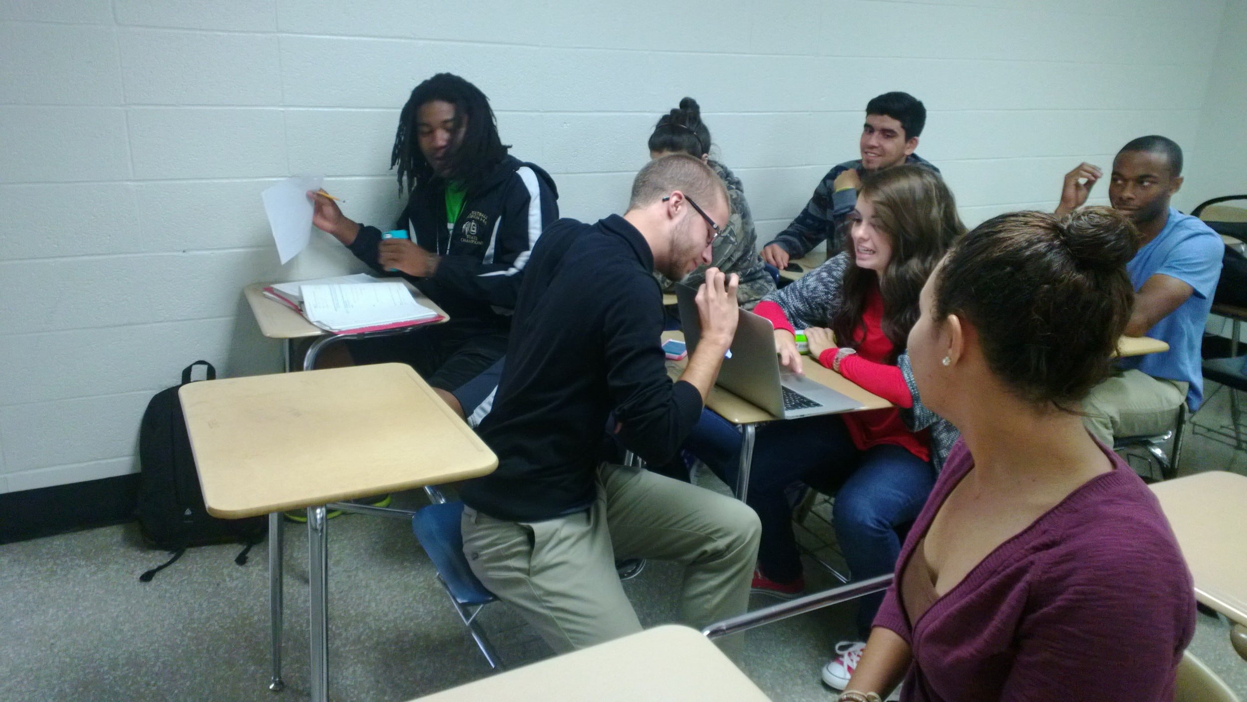 Freshman William McDonald (middle left) &nbsp;looks back at freshman Danielle Berry (middle).